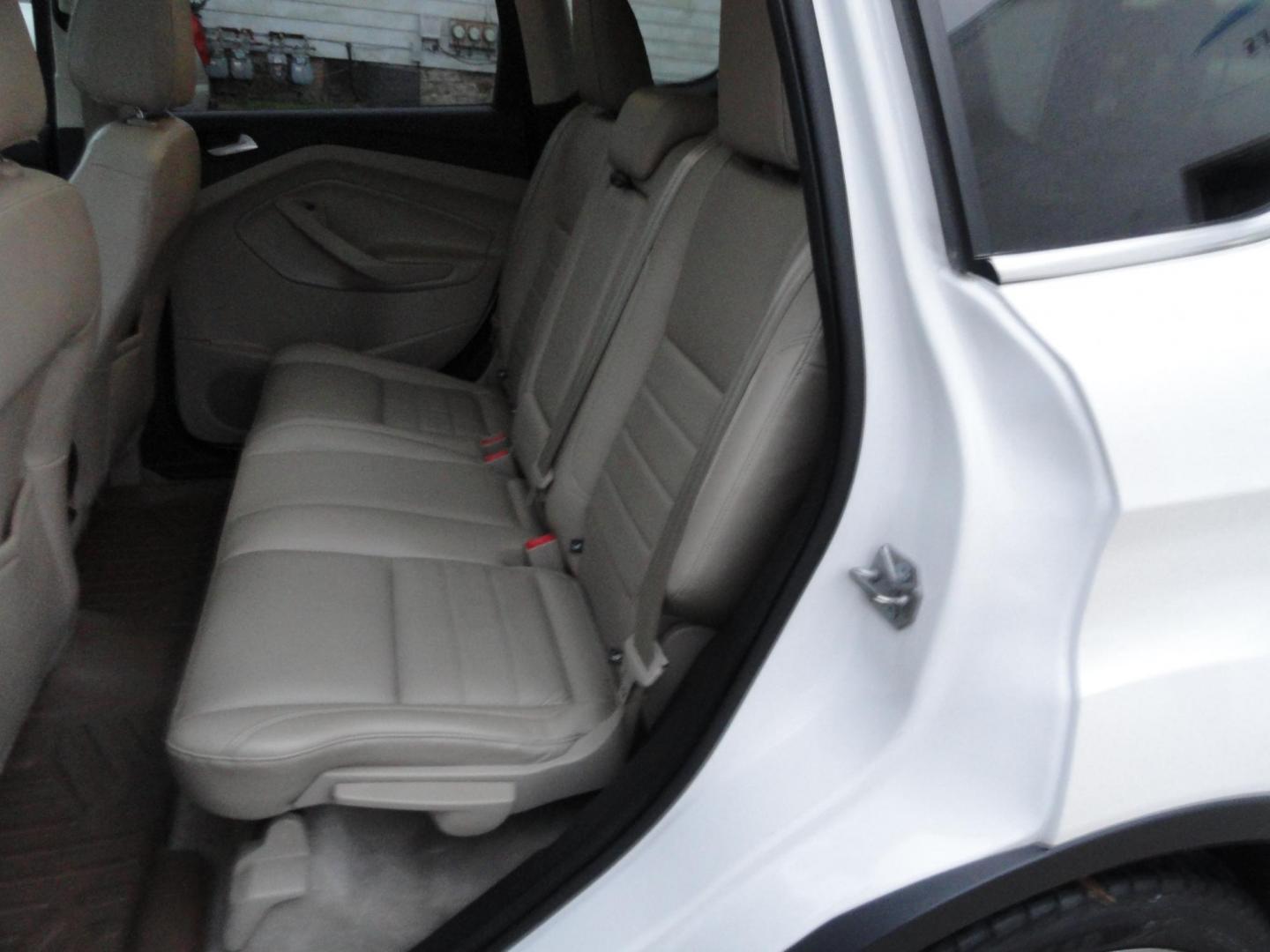 2015 White Platinum Tricoat /Tan Ford Escape Titanium 4WD (1FMCU9J94FU) with an 2.0L L4 DOHC 16V engine, 6-Speed Automatic transmission, located at 827 W 26th Street, Erie, PA, 16508, (814) 455-3401, 42.105431, -80.090942 - Photo#33