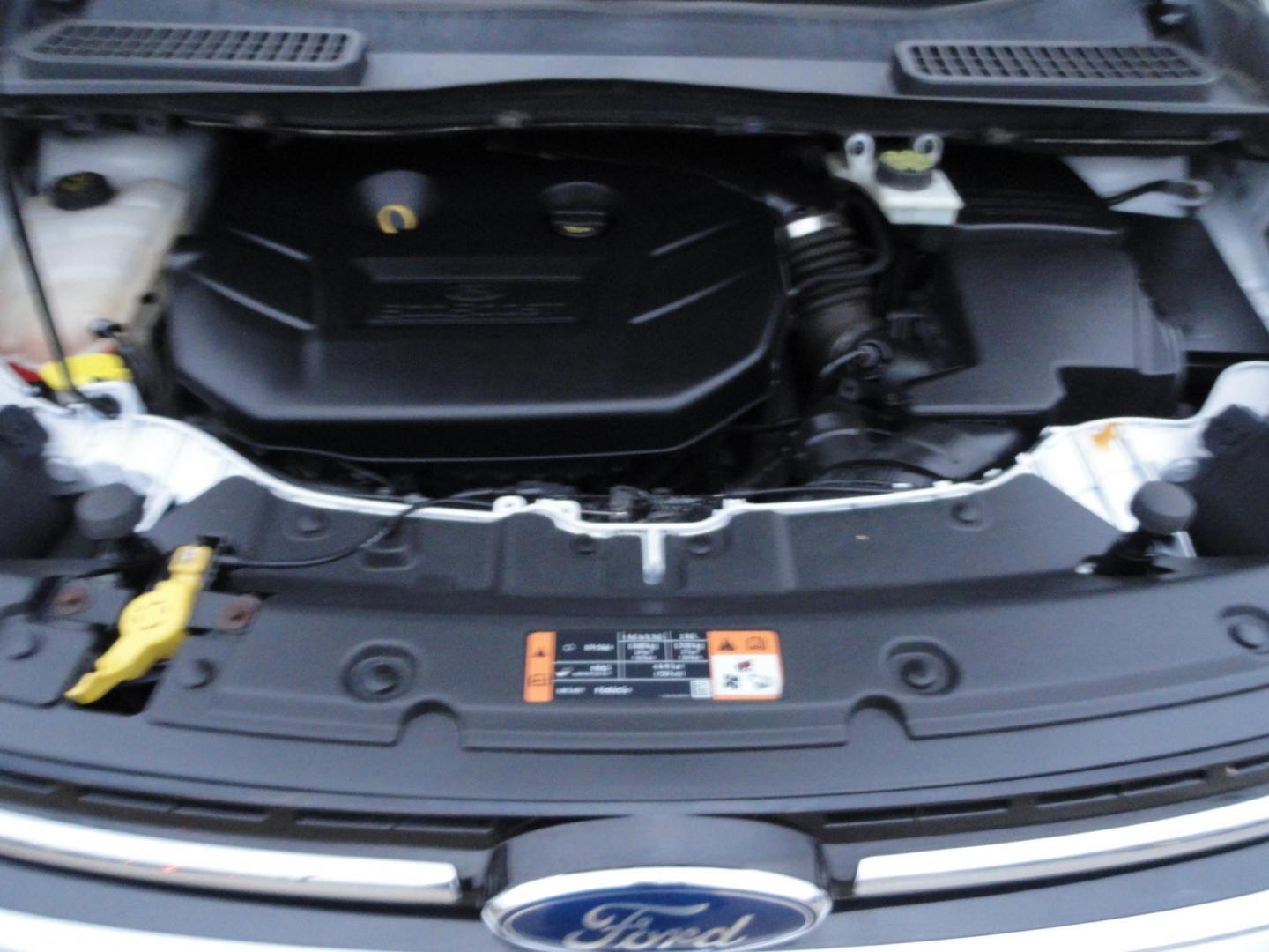 2015 White Platinum Tricoat /Tan Ford Escape Titanium 4WD (1FMCU9J94FU) with an 2.0L L4 DOHC 16V engine, 6-Speed Automatic transmission, located at 827 W 26th Street, Erie, PA, 16508, (814) 455-3401, 42.105431, -80.090942 - Photo#51