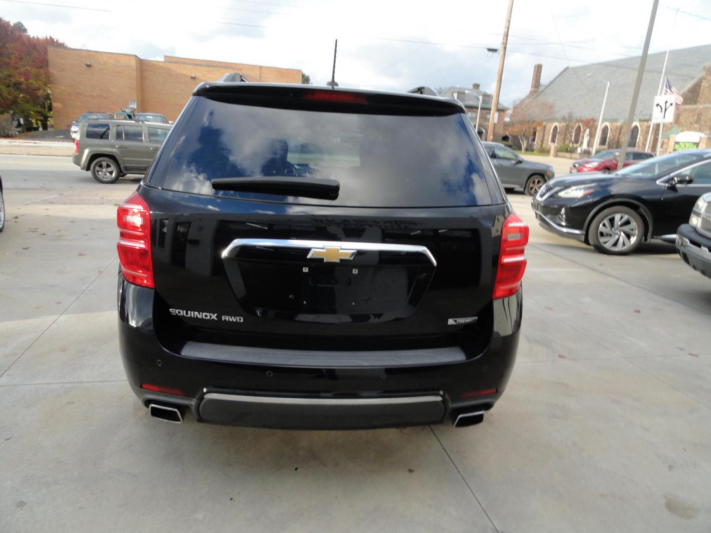 2017 Black Metallic /Greystone Chevrolet Equinox Premier AWD (2GNFLGE30H6) with an 3.6L V6 DOHC 24V engine, 6A transmission, located at 827 W 26th Street, Erie, PA, 16508, (814) 455-3401, 42.105431, -80.090942 - Photo#4