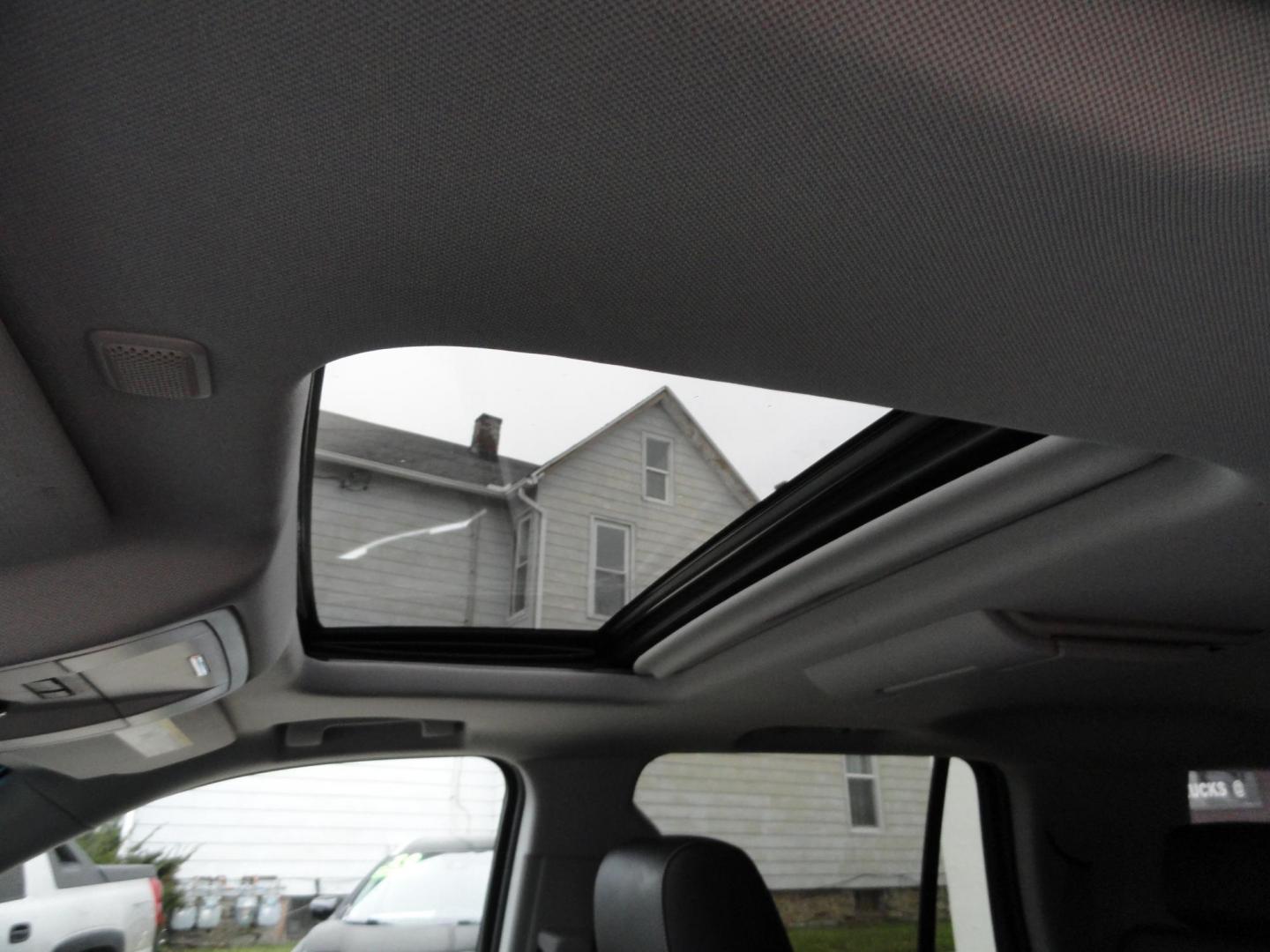 2015 Diamond White Tricoat /Jet Black Chevrolet Tahoe LTZ 4WD (1GNSKCKC5FR) with an 5.3L V8 OHV 16V engine, 6-Speed Automatic transmission, located at 827 W 26th Street, Erie, PA, 16508, (814) 455-3401, 42.105431, -80.090942 - Photo#28