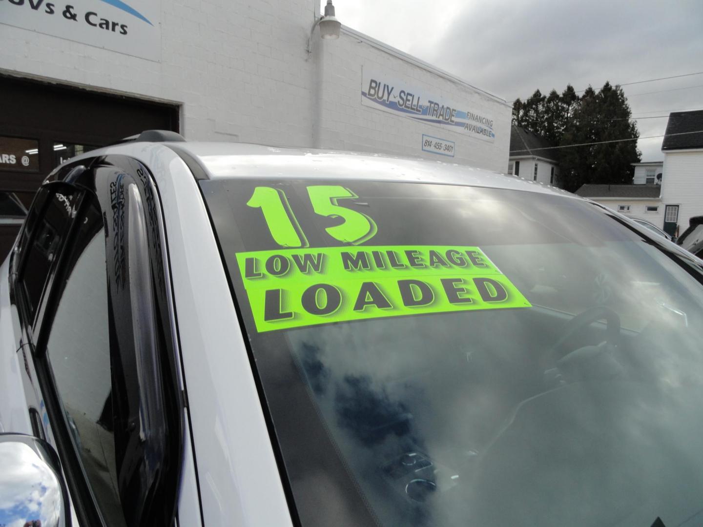 2015 Bright White /Black Jeep Grand Cherokee Limited 4WD (1C4RJFBG8FC) with an 3.6L V6 DOHC 24V engine, 8-Speed Automatic transmission, located at 827 W 26th Street, Erie, PA, 16508, (814) 455-3401, 42.105431, -80.090942 - Photo#2