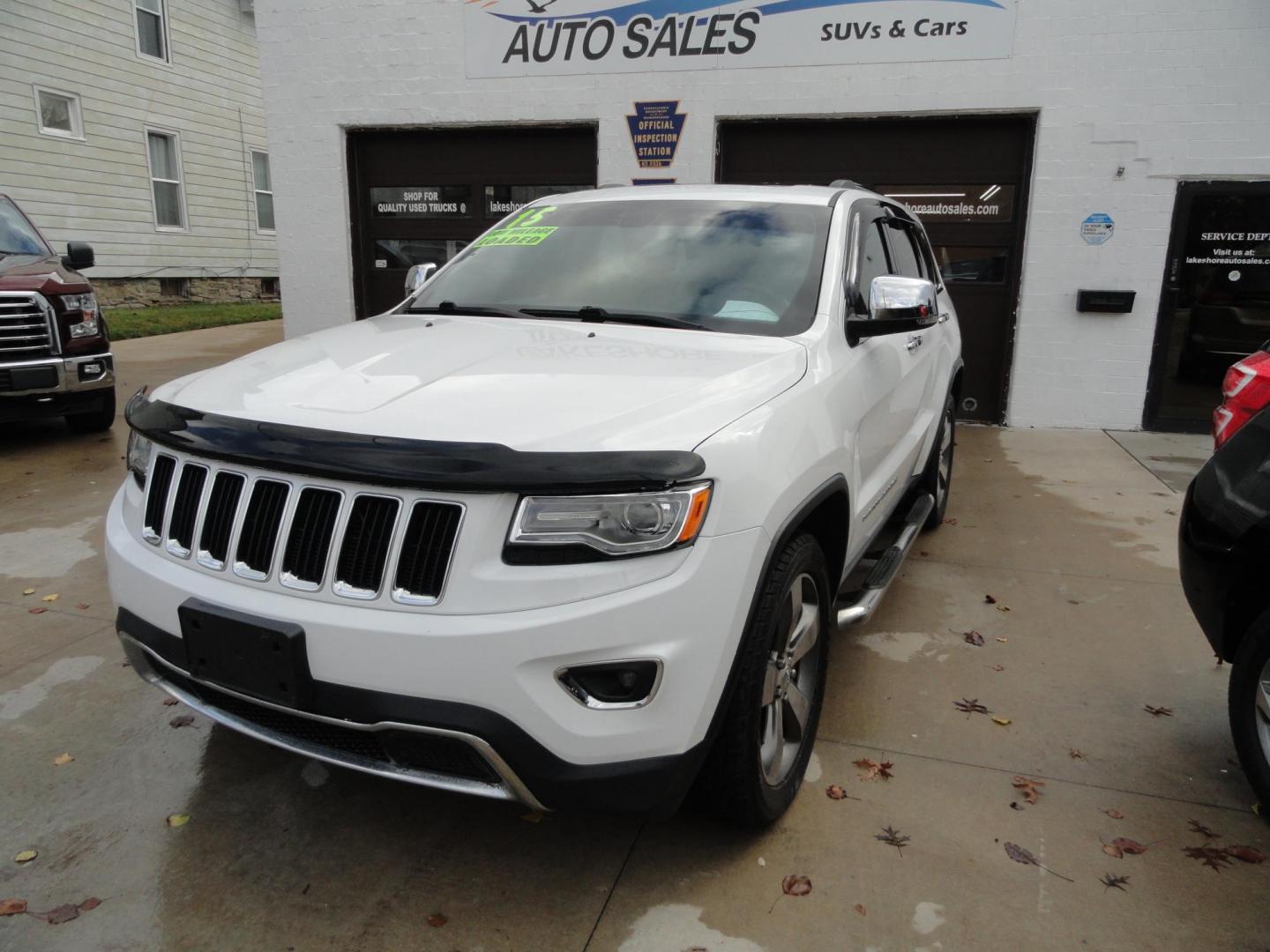 2015 Bright White /Black Jeep Grand Cherokee Limited 4WD (1C4RJFBG8FC) with an 3.6L V6 DOHC 24V engine, 8-Speed Automatic transmission, located at 827 W 26th Street, Erie, PA, 16508, (814) 455-3401, 42.105431, -80.090942 - Photo#7