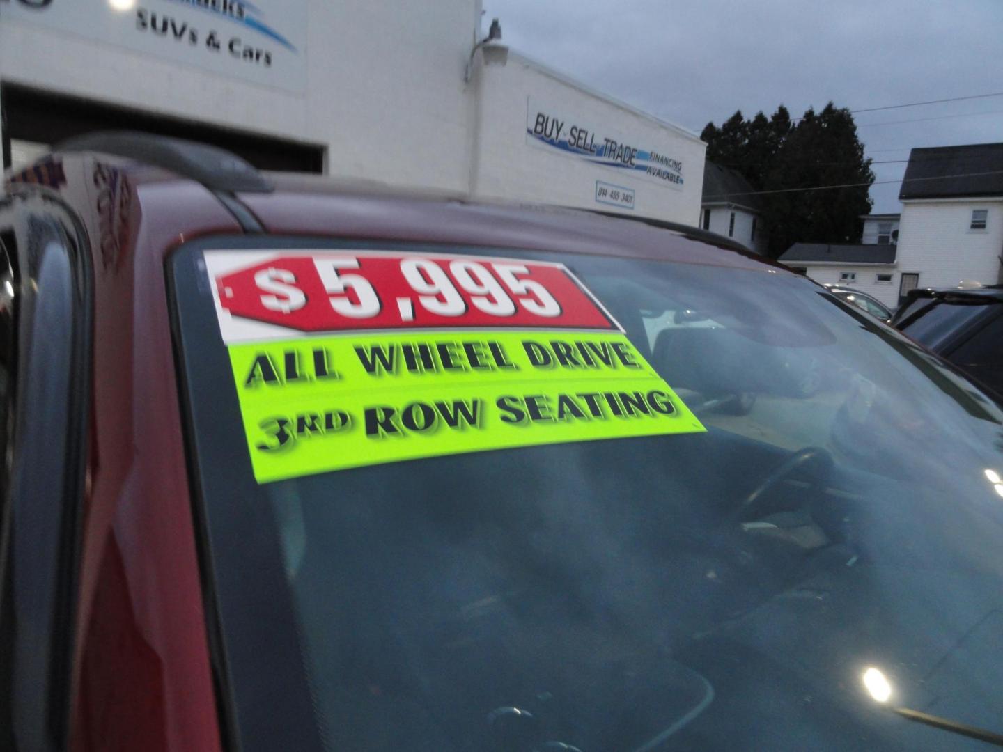 2011 Red Jewel Tintcoat /Graphite Chevrolet Traverse LT AWD (1GNKVGED3BJ) with an 3.6L V6 DOHC 24V engine, 6-Speed Automatic transmission, located at 827 W 26th Street, Erie, PA, 16508, (814) 455-3401, 42.105431, -80.090942 - Photo#2
