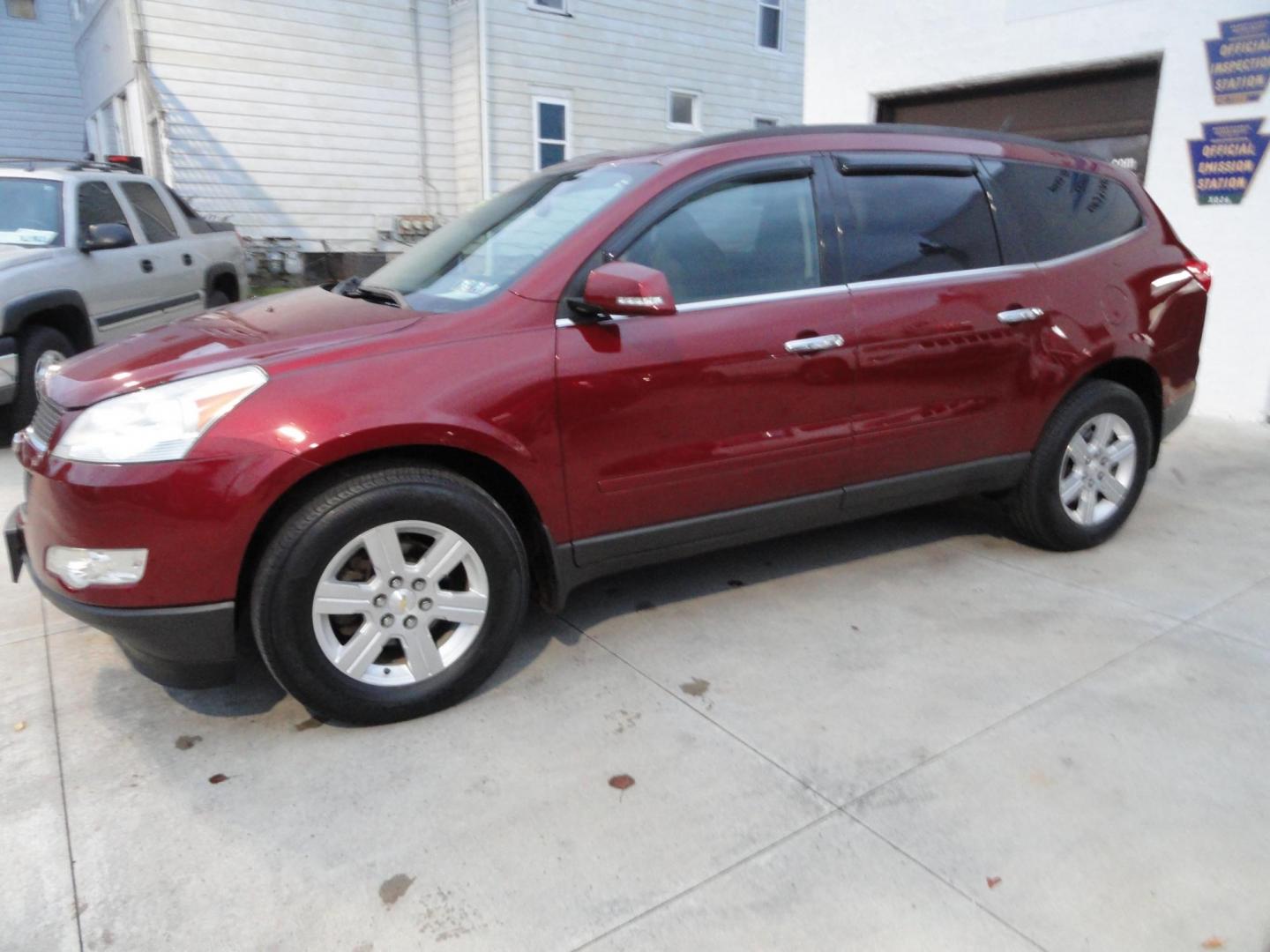 2011 Red Jewel Tintcoat /Graphite Chevrolet Traverse LT AWD (1GNKVGED3BJ) with an 3.6L V6 DOHC 24V engine, 6-Speed Automatic transmission, located at 827 W 26th Street, Erie, PA, 16508, (814) 455-3401, 42.105431, -80.090942 - Photo#6