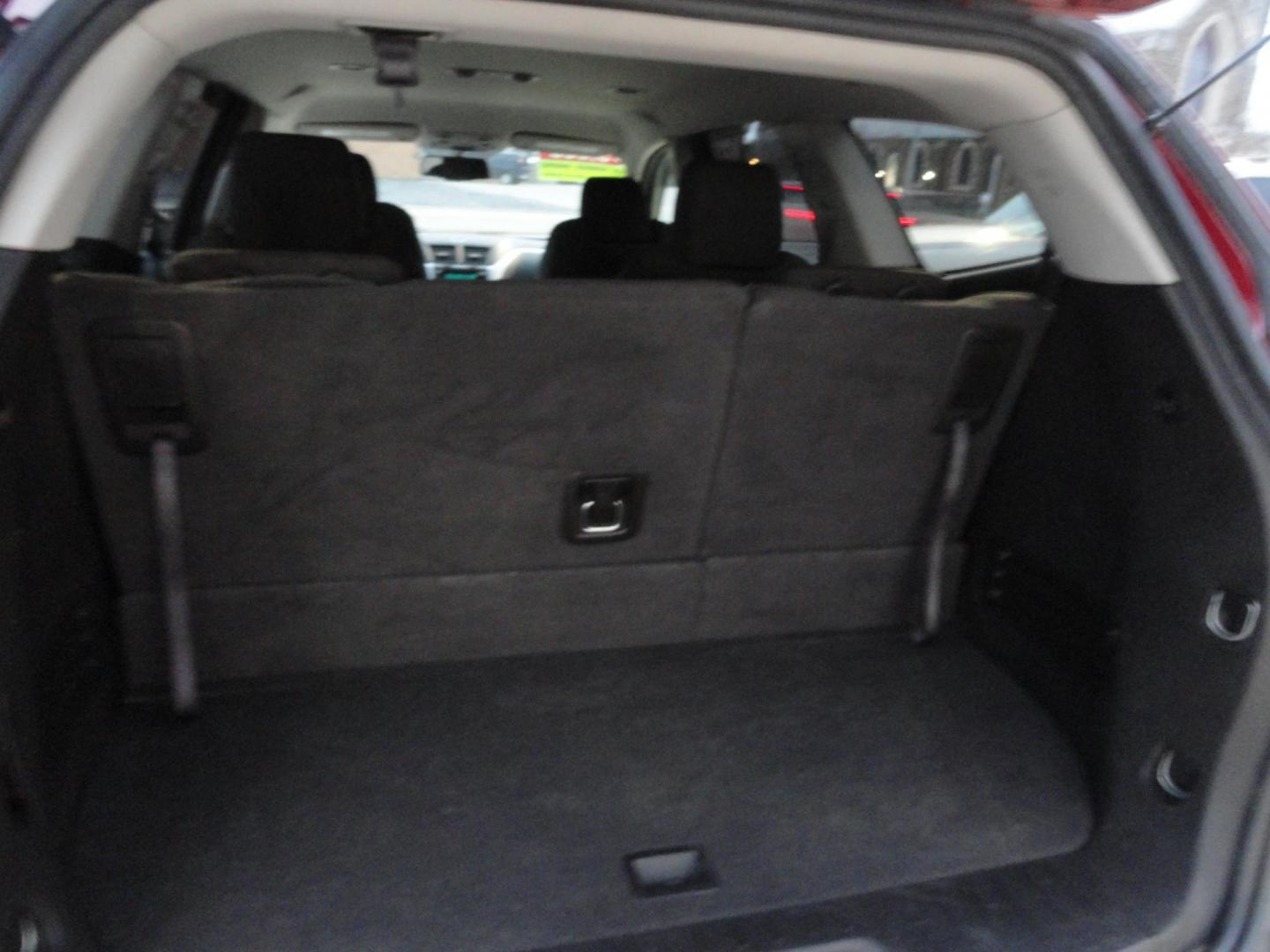 2011 Red Jewel Tintcoat /Graphite Chevrolet Traverse LT AWD (1GNKVGED3BJ) with an 3.6L V6 DOHC 24V engine, 6-Speed Automatic transmission, located at 827 W 26th Street, Erie, PA, 16508, (814) 455-3401, 42.105431, -80.090942 - Photo#24