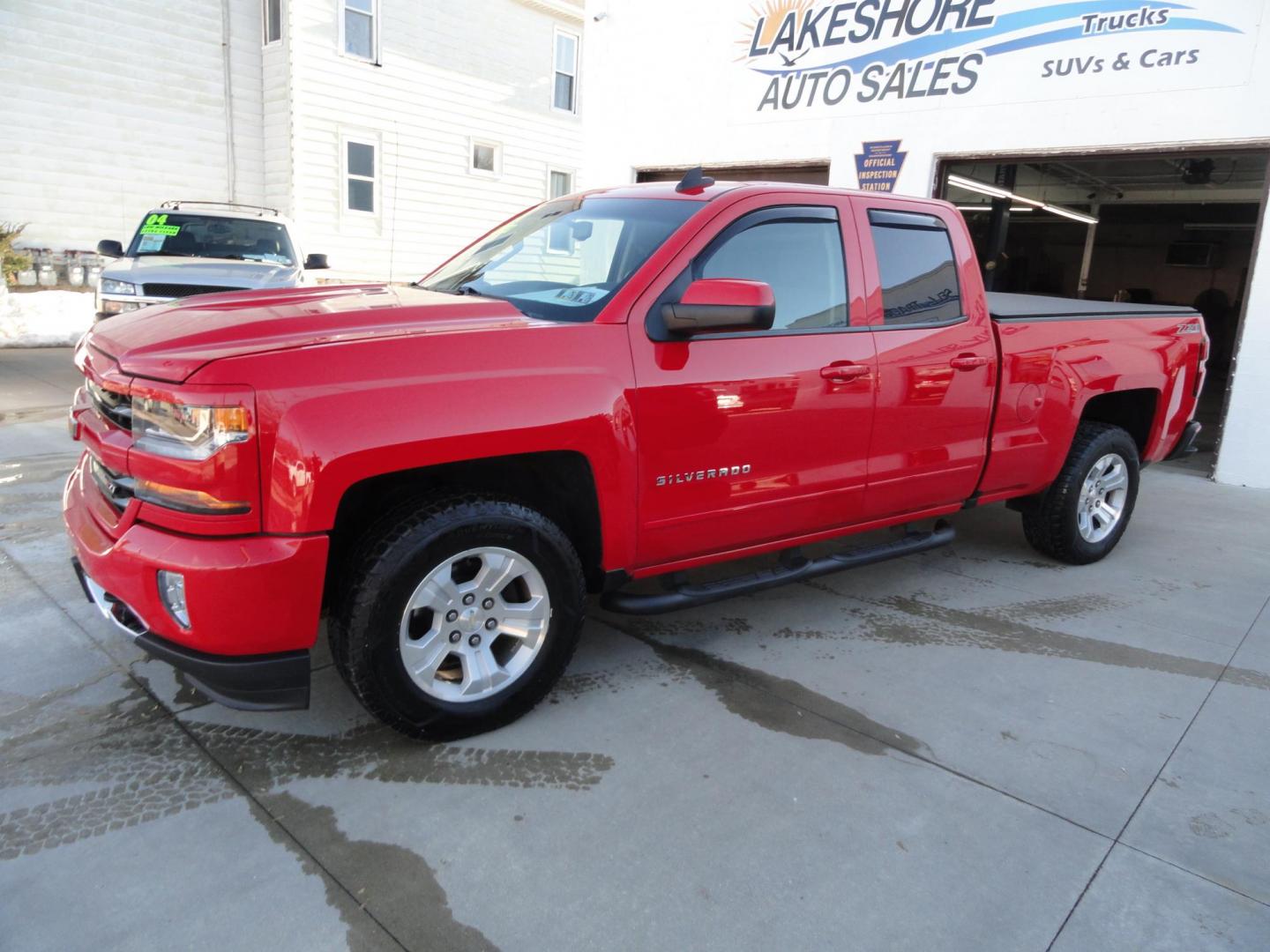 2017 Red Hot /Graphite Chevrolet Silverado 1500 LT Double Cab 4WD (1GCVKREC5HZ) with an 5.3L V8 OHV 16V engine, 6A transmission, located at 827 W 26th Street, Erie, PA, 16508, (814) 455-3401, 42.105431, -80.090942 - Thanks for looking at our super clean recent arrival. This is the 1500 Silverado LT model Double Cab with lots of options including four-wheel drive, the 5.3 V-8, heated seats, power drivers seat, remote start, Z71 Offroad package, back up camera, Tonneau cover, spray in bed liner, both keys and rem - Photo#6
