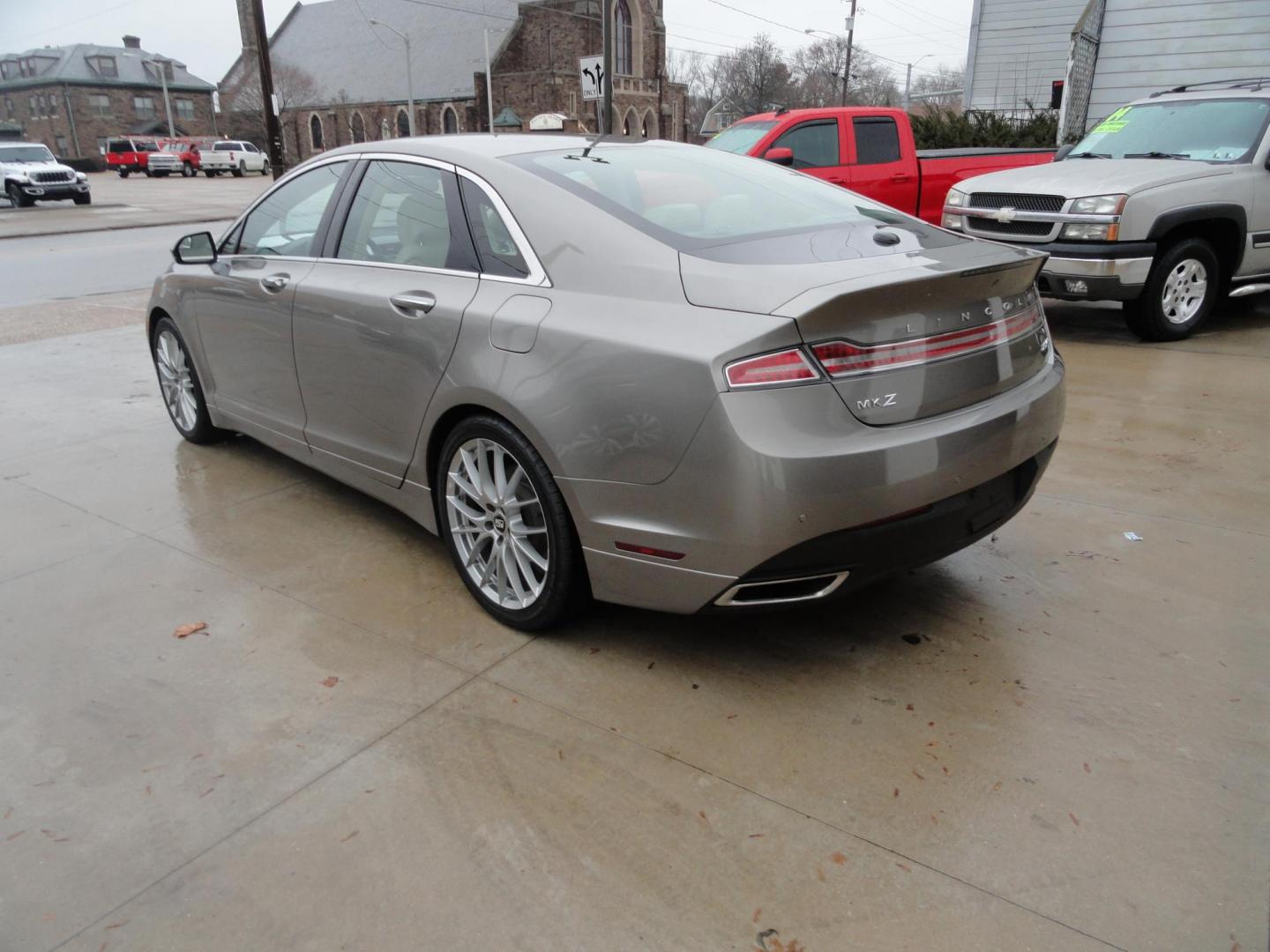 2015 Luxe Metallic /Island Lincoln MKZ AWD (3LN6L2J91FR) with an 2.0L L4 DOHC 16V engine, 6-Speed Automatic transmission, located at 827 W 26th Street, Erie, PA, 16508, (814) 455-3401, 42.105431, -80.090942 - Thanks for looking at our low mileage two owner accident-free new arrival. This is the all-wheel drive model with way too many options to mention. A full service was just completed in our service department and she's ready to go. Hurry in or call today as ones this clean in this price range with low - Photo#6