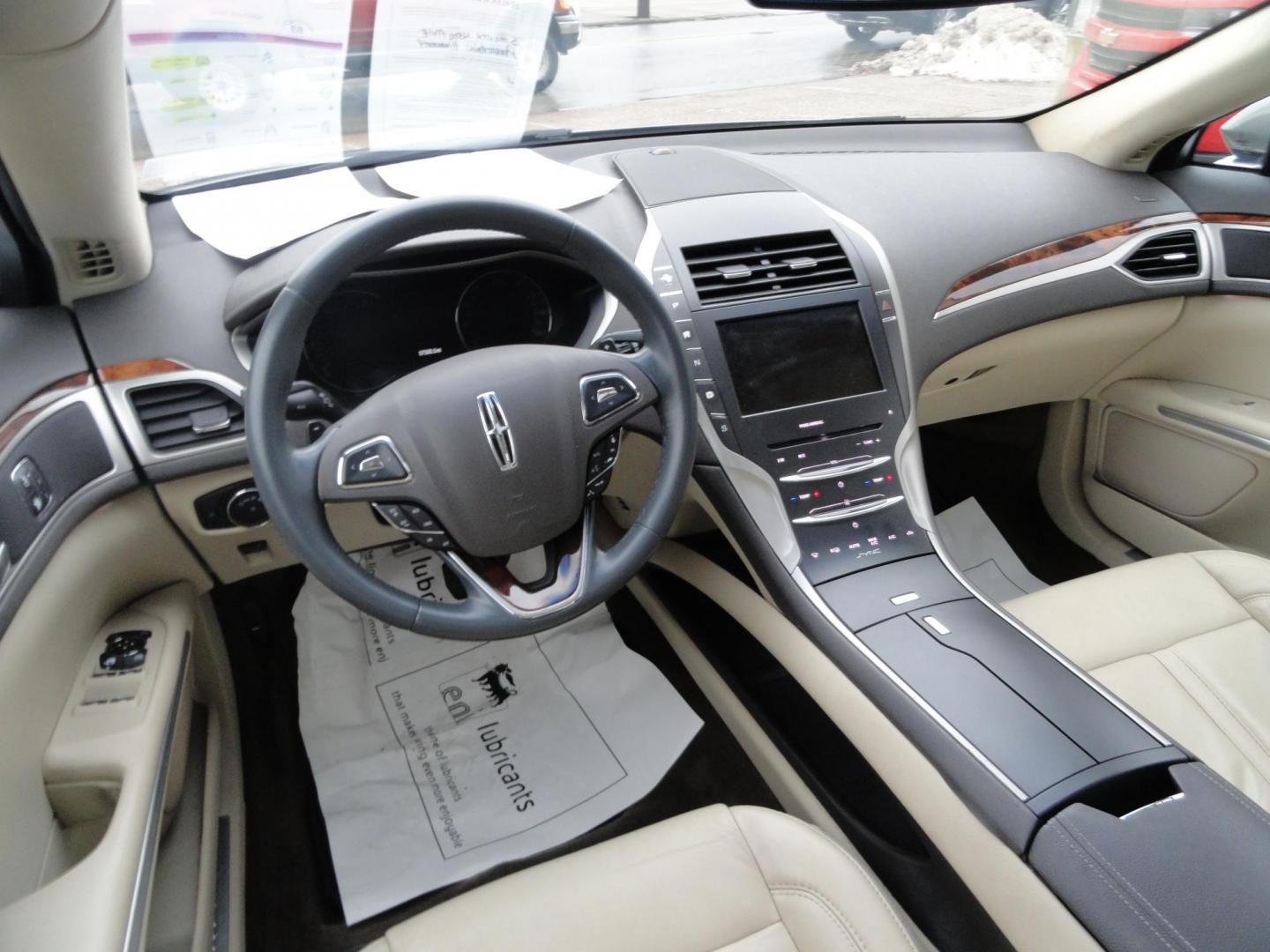 2015 Luxe Metallic /Island Lincoln MKZ AWD (3LN6L2J91FR) with an 2.0L L4 DOHC 16V engine, 6-Speed Automatic transmission, located at 827 W 26th Street, Erie, PA, 16508, (814) 455-3401, 42.105431, -80.090942 - Thanks for looking at our low mileage two owner accident-free new arrival. This is the all-wheel drive model with way too many options to mention. A full service was just completed in our service department and she's ready to go. Hurry in or call today as ones this clean in this price range with low - Photo#10