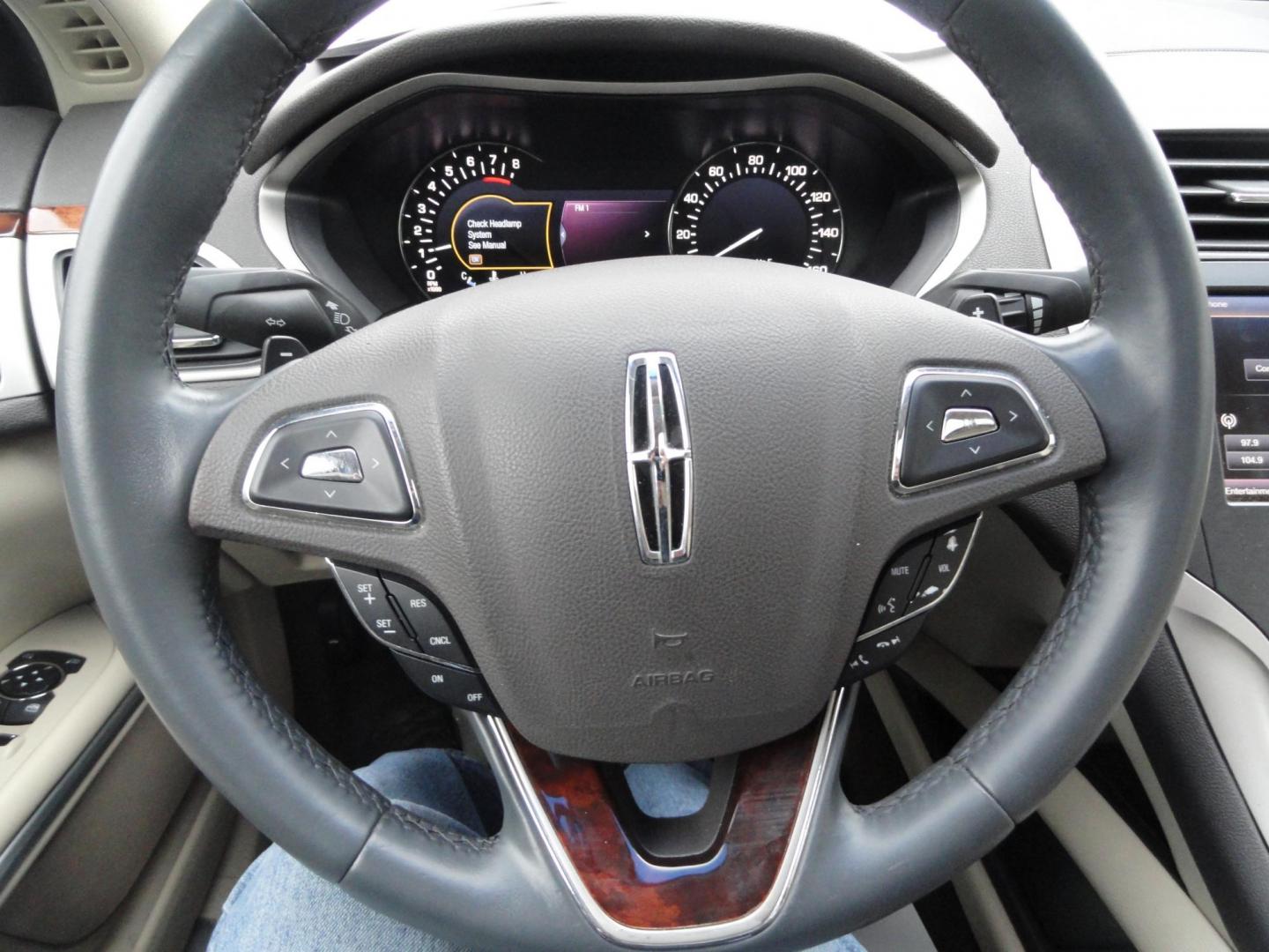 2015 Luxe Metallic /Island Lincoln MKZ AWD (3LN6L2J91FR) with an 2.0L L4 DOHC 16V engine, 6-Speed Automatic transmission, located at 827 W 26th Street, Erie, PA, 16508, (814) 455-3401, 42.105431, -80.090942 - Thanks for looking at our low mileage two owner accident-free new arrival. This is the all-wheel drive model with way too many options to mention. A full service was just completed in our service department and she's ready to go. Hurry in or call today as ones this clean in this price range with low - Photo#15