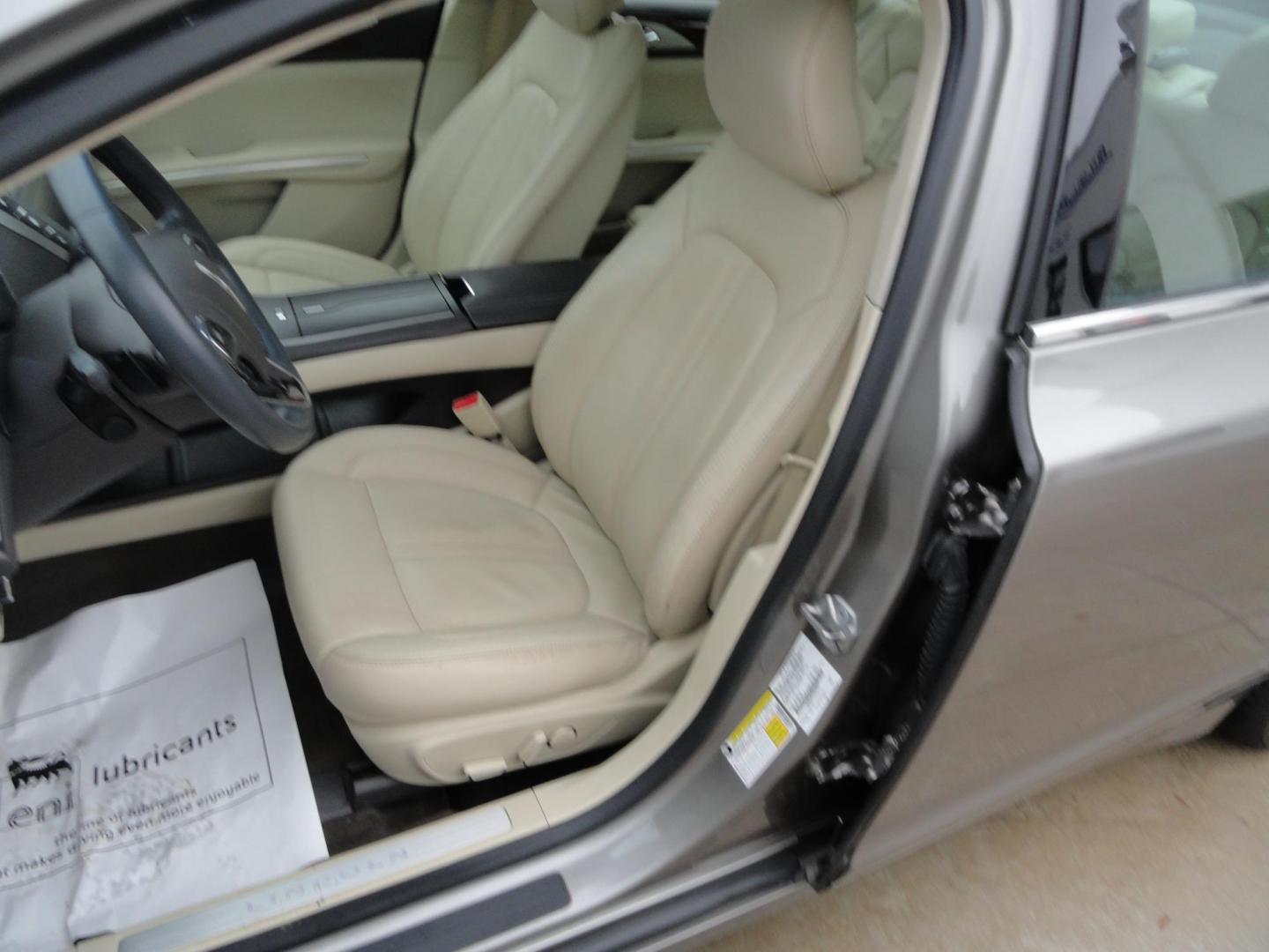 2015 Luxe Metallic /Island Lincoln MKZ AWD (3LN6L2J91FR) with an 2.0L L4 DOHC 16V engine, 6-Speed Automatic transmission, located at 827 W 26th Street, Erie, PA, 16508, (814) 455-3401, 42.105431, -80.090942 - Thanks for looking at our low mileage two owner accident-free new arrival. This is the all-wheel drive model with way too many options to mention. A full service was just completed in our service department and she's ready to go. Hurry in or call today as ones this clean in this price range with low - Photo#22