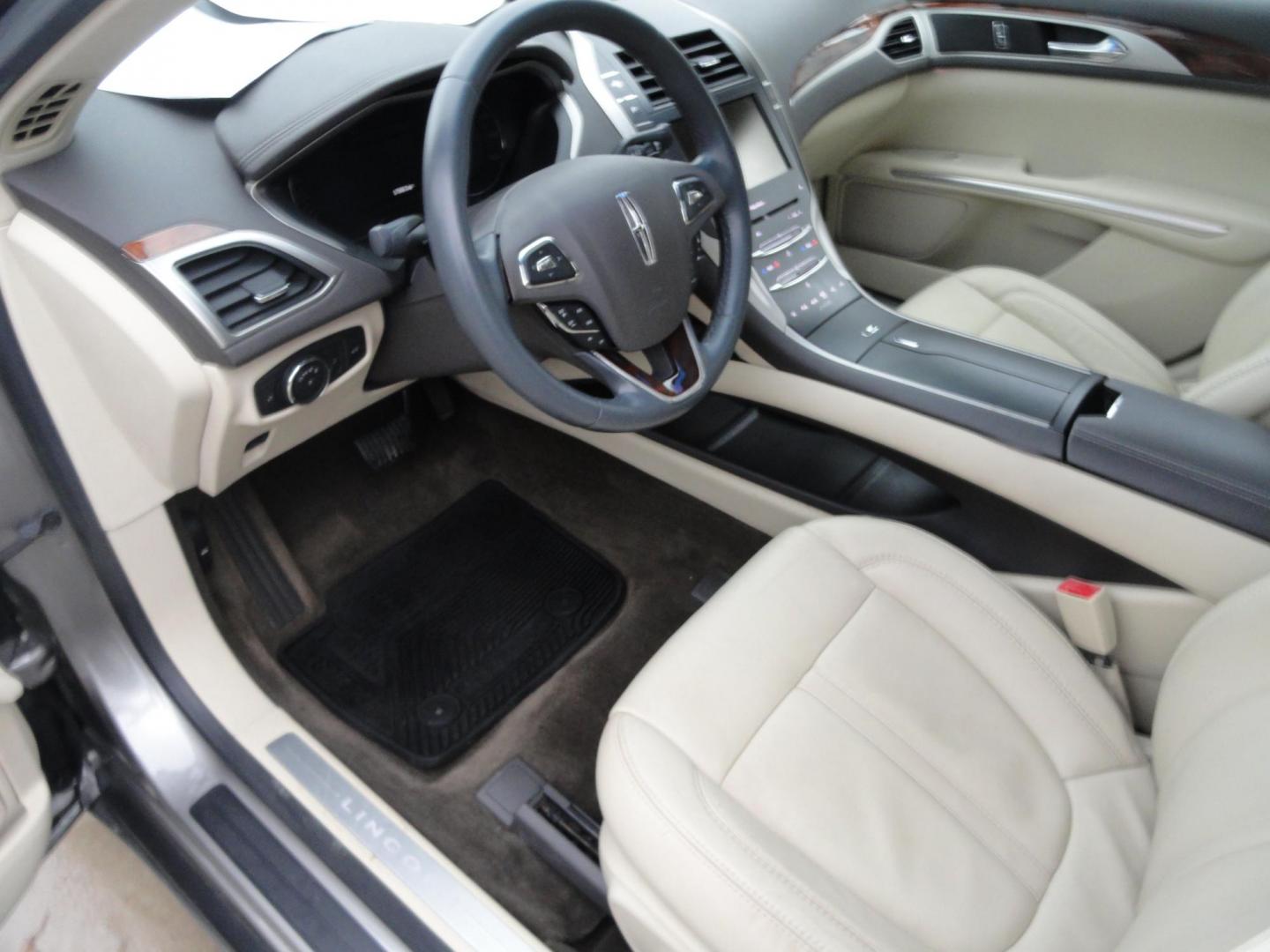 2015 Luxe Metallic /Island Lincoln MKZ AWD (3LN6L2J91FR) with an 2.0L L4 DOHC 16V engine, 6-Speed Automatic transmission, located at 827 W 26th Street, Erie, PA, 16508, (814) 455-3401, 42.105431, -80.090942 - Thanks for looking at our low mileage two owner accident-free new arrival. This is the all-wheel drive model with way too many options to mention. A full service was just completed in our service department and she's ready to go. Hurry in or call today as ones this clean in this price range with low - Photo#21