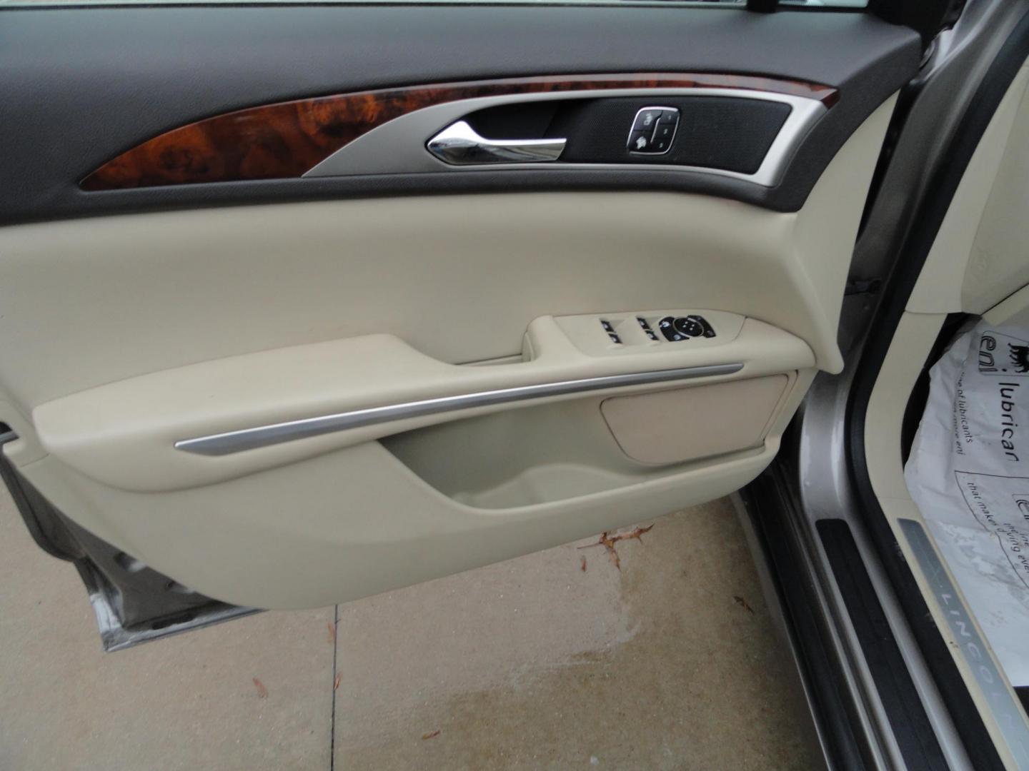 2015 Luxe Metallic /Island Lincoln MKZ AWD (3LN6L2J91FR) with an 2.0L L4 DOHC 16V engine, 6-Speed Automatic transmission, located at 827 W 26th Street, Erie, PA, 16508, (814) 455-3401, 42.105431, -80.090942 - Thanks for looking at our low mileage two owner accident-free new arrival. This is the all-wheel drive model with way too many options to mention. A full service was just completed in our service department and she's ready to go. Hurry in or call today as ones this clean in this price range with low - Photo#24