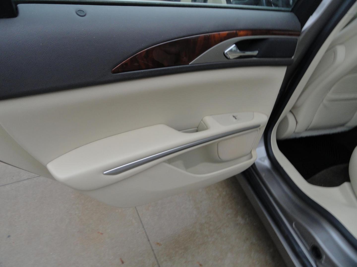 2015 Luxe Metallic /Island Lincoln MKZ AWD (3LN6L2J91FR) with an 2.0L L4 DOHC 16V engine, 6-Speed Automatic transmission, located at 827 W 26th Street, Erie, PA, 16508, (814) 455-3401, 42.105431, -80.090942 - Thanks for looking at our low mileage two owner accident-free new arrival. This is the all-wheel drive model with way too many options to mention. A full service was just completed in our service department and she's ready to go. Hurry in or call today as ones this clean in this price range with low - Photo#27