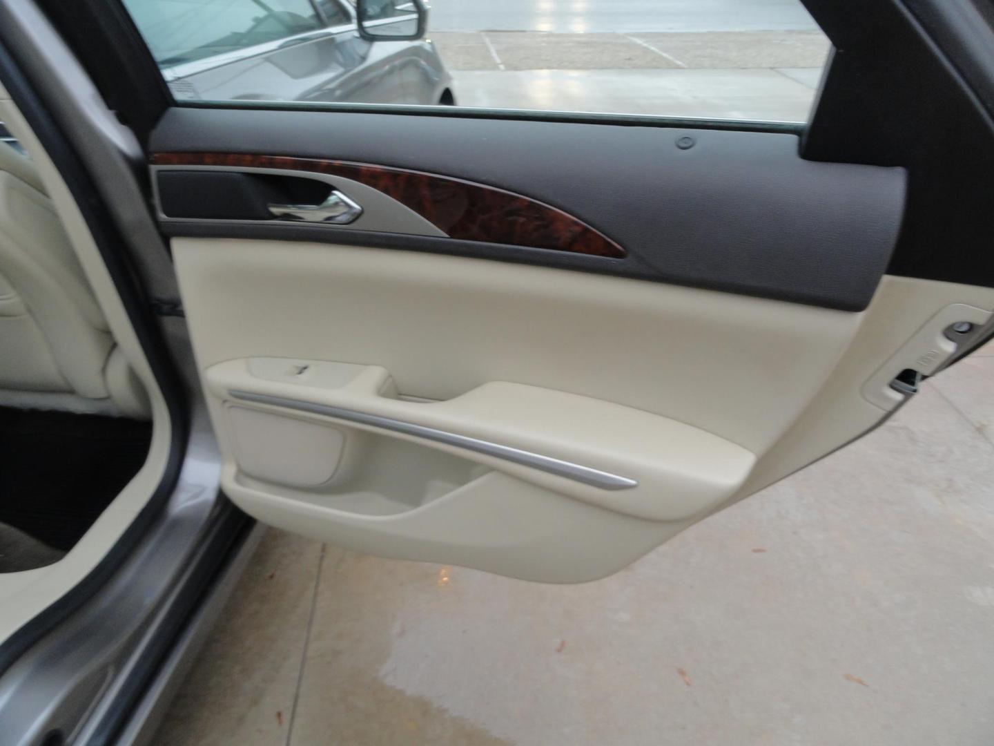 2015 Luxe Metallic /Island Lincoln MKZ AWD (3LN6L2J91FR) with an 2.0L L4 DOHC 16V engine, 6-Speed Automatic transmission, located at 827 W 26th Street, Erie, PA, 16508, (814) 455-3401, 42.105431, -80.090942 - Thanks for looking at our low mileage two owner accident-free new arrival. This is the all-wheel drive model with way too many options to mention. A full service was just completed in our service department and she's ready to go. Hurry in or call today as ones this clean in this price range with low - Photo#31