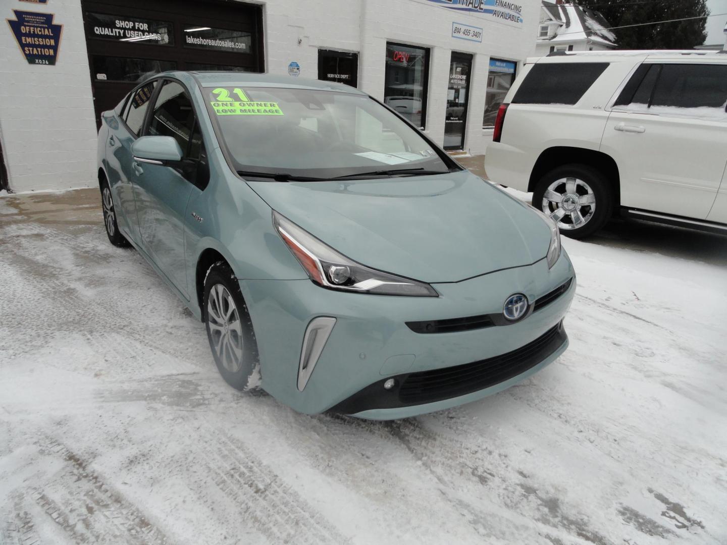2021 Sea Glass Pearl /Tan Toyota Prius LE AWD-e (JTDL9MFU1M3) with an 1.8L L4 DOHC 16V HYBRID engine, CVT transmission, located at 827 W 26th Street, Erie, PA, 16508, (814) 455-3401, 42.105431, -80.090942 - Thanks for looking at our super low mileage one owner recent arrival. This is the LE all-wheel drive E model with all the options including remote start. This vehicle belonged to an elderly customer who had to stop driving due to age which explains the low mileage. This vehicle has both remotes, the - Photo#0