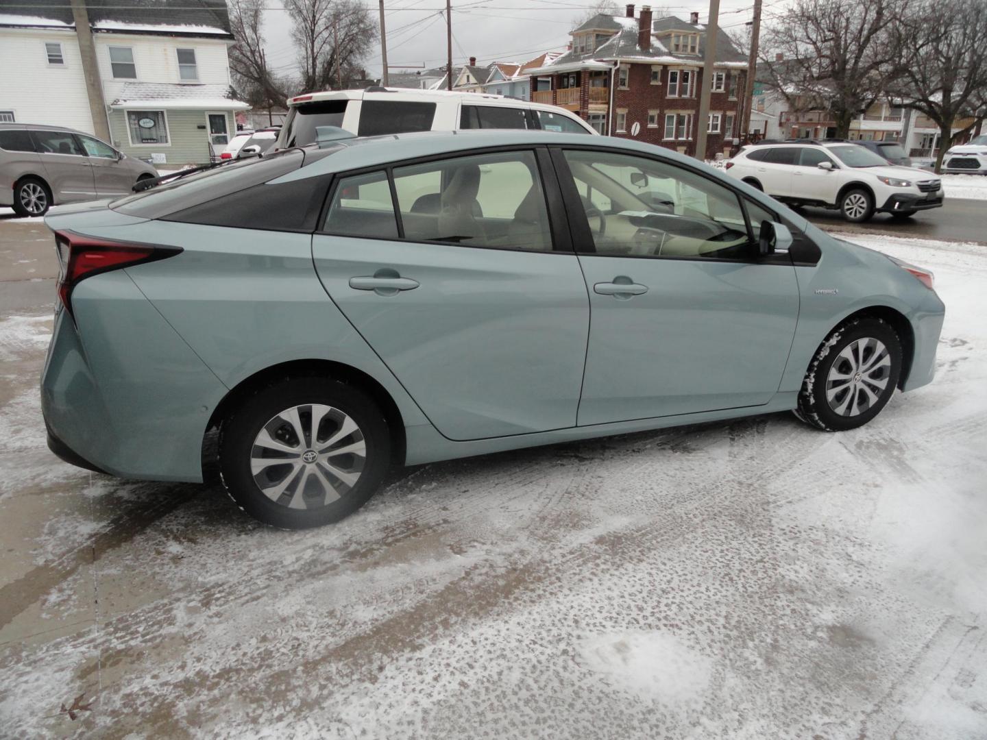2021 Sea Glass Pearl /Tan Toyota Prius LE AWD-e (JTDL9MFU1M3) with an 1.8L L4 DOHC 16V HYBRID engine, CVT transmission, located at 827 W 26th Street, Erie, PA, 16508, (814) 455-3401, 42.105431, -80.090942 - Thanks for looking at our super low mileage one owner recent arrival. This is the LE all-wheel drive E model with all the options including remote start. This vehicle belonged to an elderly customer who had to stop driving due to age which explains the low mileage. This vehicle has both remotes, the - Photo#2