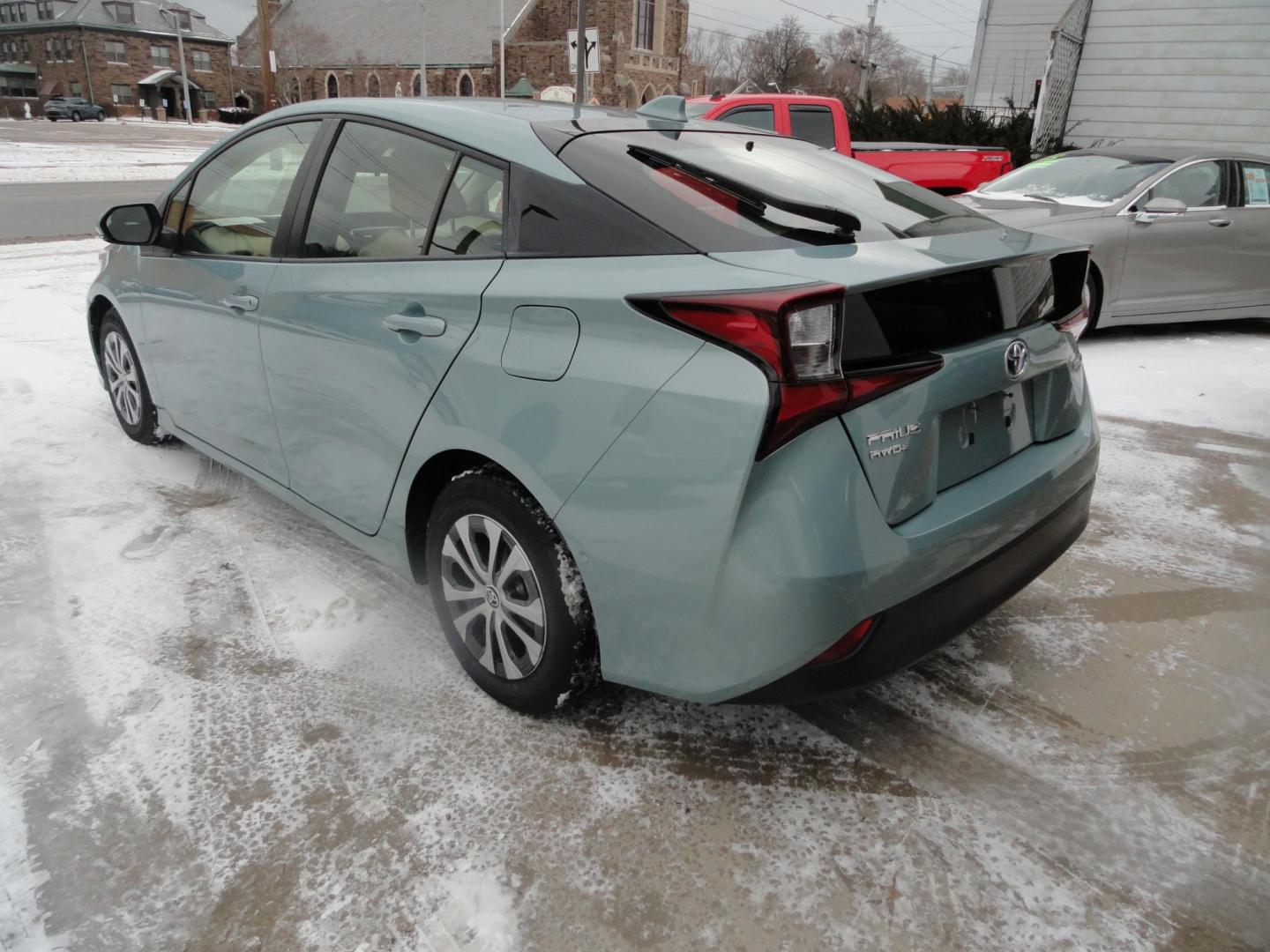 2021 Sea Glass Pearl /Tan Toyota Prius LE AWD-e (JTDL9MFU1M3) with an 1.8L L4 DOHC 16V HYBRID engine, CVT transmission, located at 827 W 26th Street, Erie, PA, 16508, (814) 455-3401, 42.105431, -80.090942 - Thanks for looking at our super low mileage one owner recent arrival. This is the LE all-wheel drive E model with all the options including remote start. This vehicle belonged to an elderly customer who had to stop driving due to age which explains the low mileage. This vehicle has both remotes, the - Photo#4
