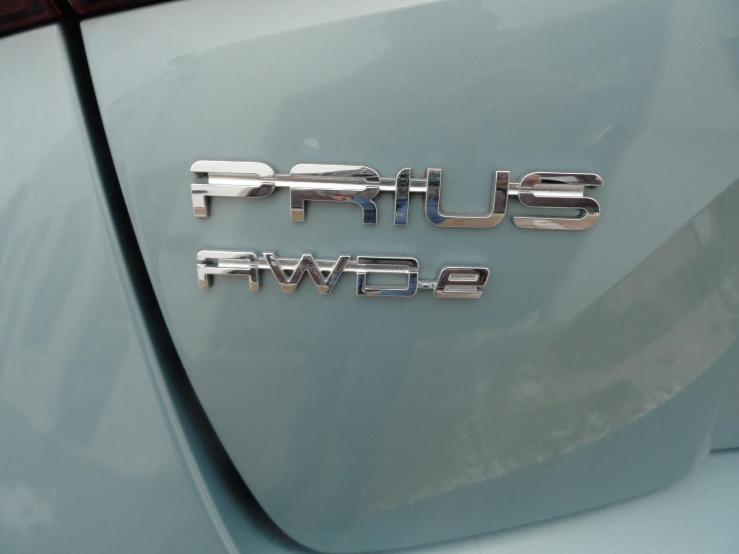 2021 Sea Glass Pearl /Tan Toyota Prius LE AWD-e (JTDL9MFU1M3) with an 1.8L L4 DOHC 16V HYBRID engine, CVT transmission, located at 827 W 26th Street, Erie, PA, 16508, (814) 455-3401, 42.105431, -80.090942 - Thanks for looking at our super low mileage one owner recent arrival. This is the LE all-wheel drive E model with all the options including remote start. This vehicle belonged to an elderly customer who had to stop driving due to age which explains the low mileage. This vehicle has both remotes, the - Photo#8