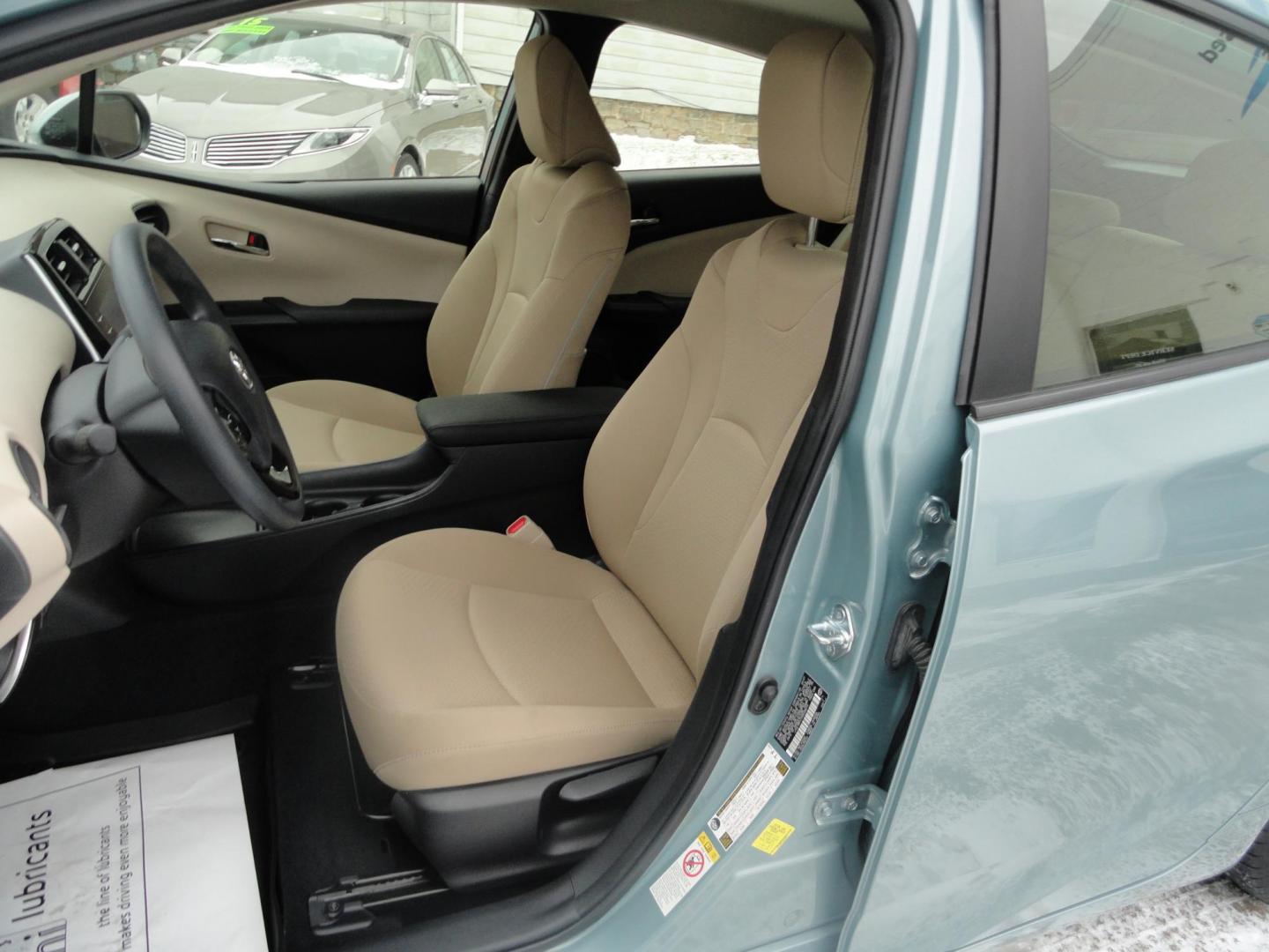 2021 Sea Glass Pearl /Tan Toyota Prius LE AWD-e (JTDL9MFU1M3) with an 1.8L L4 DOHC 16V HYBRID engine, CVT transmission, located at 827 W 26th Street, Erie, PA, 16508, (814) 455-3401, 42.105431, -80.090942 - Thanks for looking at our super low mileage one owner recent arrival. This is the LE all-wheel drive E model with all the options including remote start. This vehicle belonged to an elderly customer who had to stop driving due to age which explains the low mileage. This vehicle has both remotes, the - Photo#21