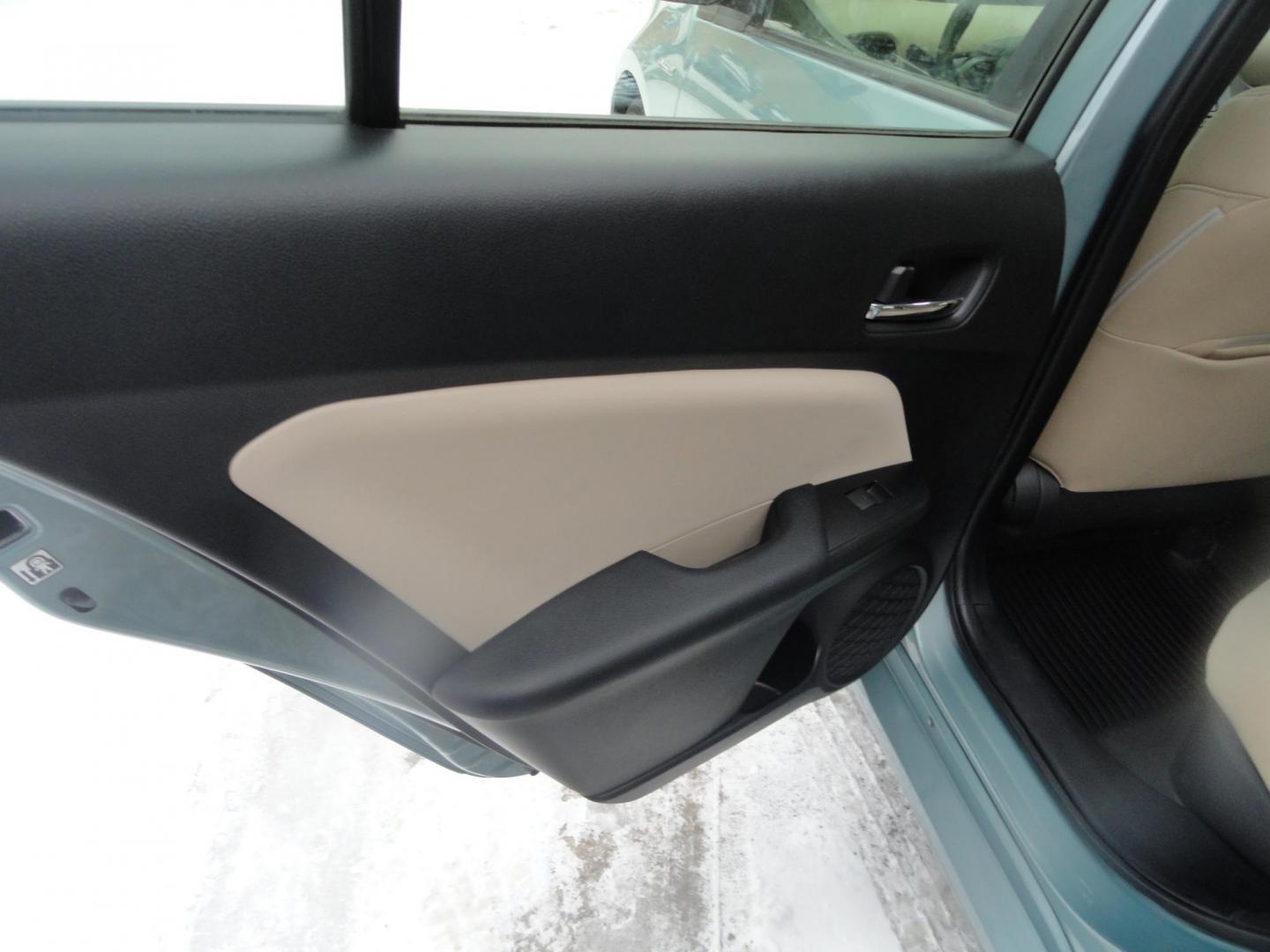 2021 Sea Glass Pearl /Tan Toyota Prius LE AWD-e (JTDL9MFU1M3) with an 1.8L L4 DOHC 16V HYBRID engine, CVT transmission, located at 827 W 26th Street, Erie, PA, 16508, (814) 455-3401, 42.105431, -80.090942 - Thanks for looking at our super low mileage one owner recent arrival. This is the LE all-wheel drive E model with all the options including remote start. This vehicle belonged to an elderly customer who had to stop driving due to age which explains the low mileage. This vehicle has both remotes, the - Photo#25