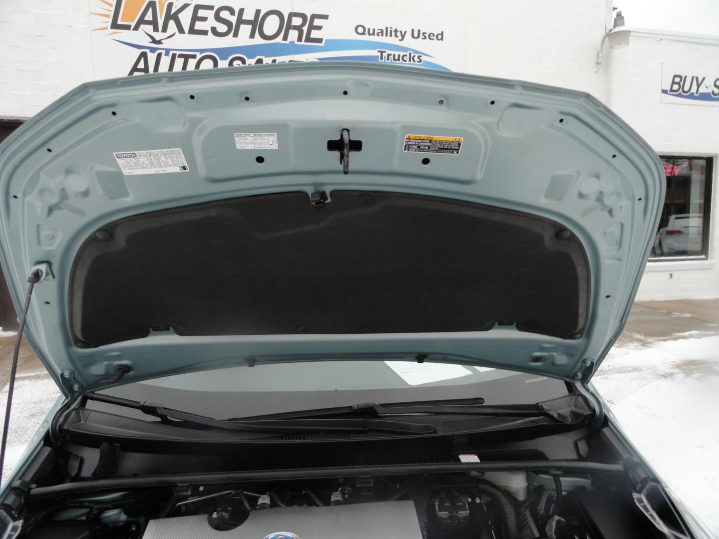 2021 Sea Glass Pearl /Tan Toyota Prius LE AWD-e (JTDL9MFU1M3) with an 1.8L L4 DOHC 16V HYBRID engine, CVT transmission, located at 827 W 26th Street, Erie, PA, 16508, (814) 455-3401, 42.105431, -80.090942 - Thanks for looking at our super low mileage one owner recent arrival. This is the LE all-wheel drive E model with all the options including remote start. This vehicle belonged to an elderly customer who had to stop driving due to age which explains the low mileage. This vehicle has both remotes, the - Photo#34