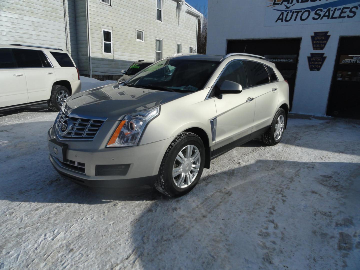2015 Champagne Silver Metallic /Tan Cadillac SRX Luxury Collection FWD (3GYFNBE31FS) with an 3.6L V6 DOHC 24V FFV engine, 6-Speed Automatic transmission, located at 827 W 26th Street, Erie, PA, 16508, (814) 455-3401, 42.105431, -80.090942 - Thanks for looking at our low mileage accident-free new arrival and a recent trade in at a local Chevrolet dealership. This vehicle was originally sold new In Florida which explains the RUST FREE exterior as well as the like new nonsmoker interior plus it comes with lots of options and it also comes - Photo#7