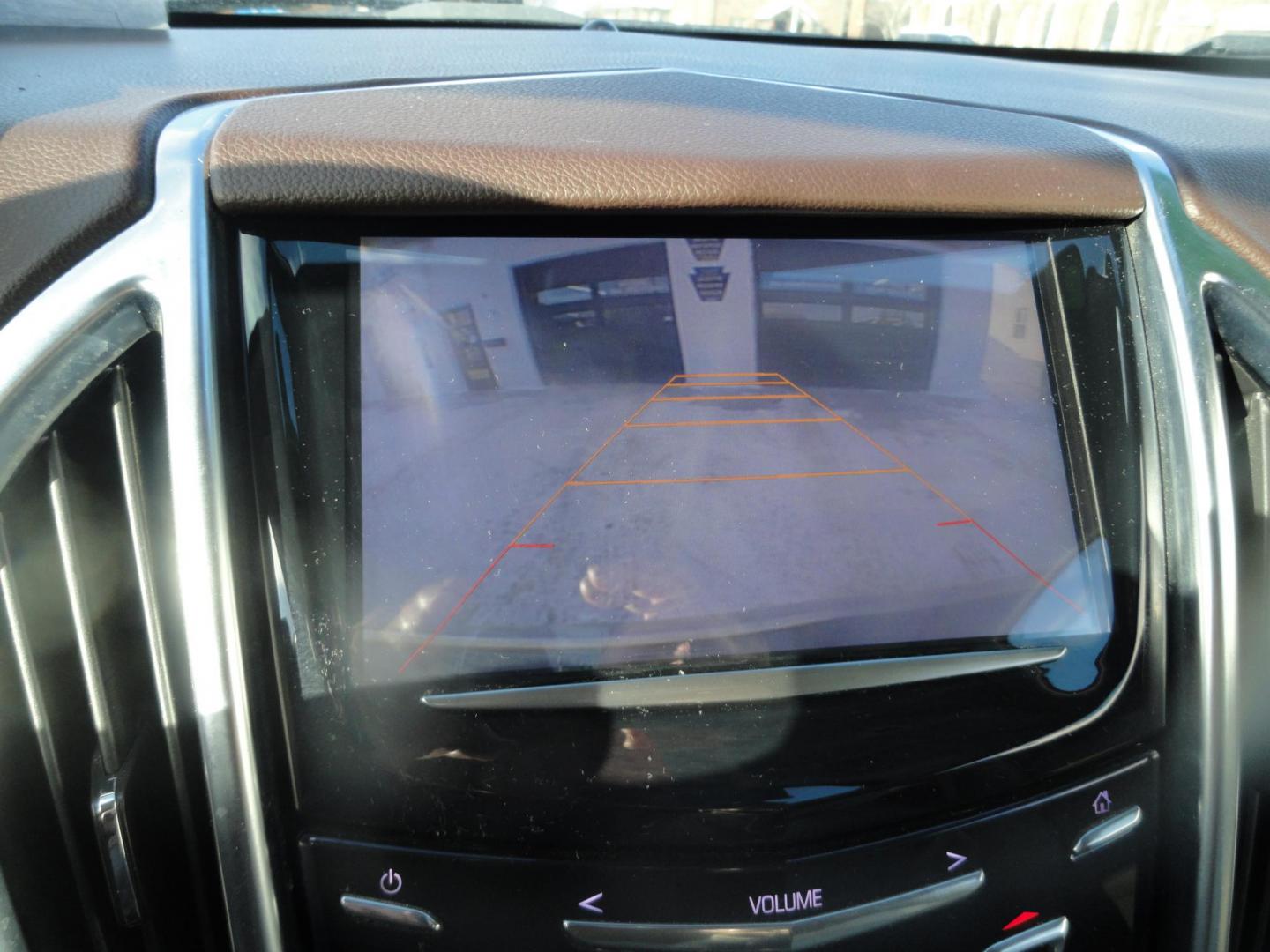 2015 Champagne Silver Metallic /Tan Cadillac SRX Luxury Collection FWD (3GYFNBE31FS) with an 3.6L V6 DOHC 24V FFV engine, 6-Speed Automatic transmission, located at 827 W 26th Street, Erie, PA, 16508, (814) 455-3401, 42.105431, -80.090942 - Thanks for looking at our low mileage accident-free new arrival and a recent trade in at a local Chevrolet dealership. This vehicle was originally sold new In Florida which explains the RUST FREE exterior as well as the like new nonsmoker interior plus it comes with lots of options and it also comes - Photo#10