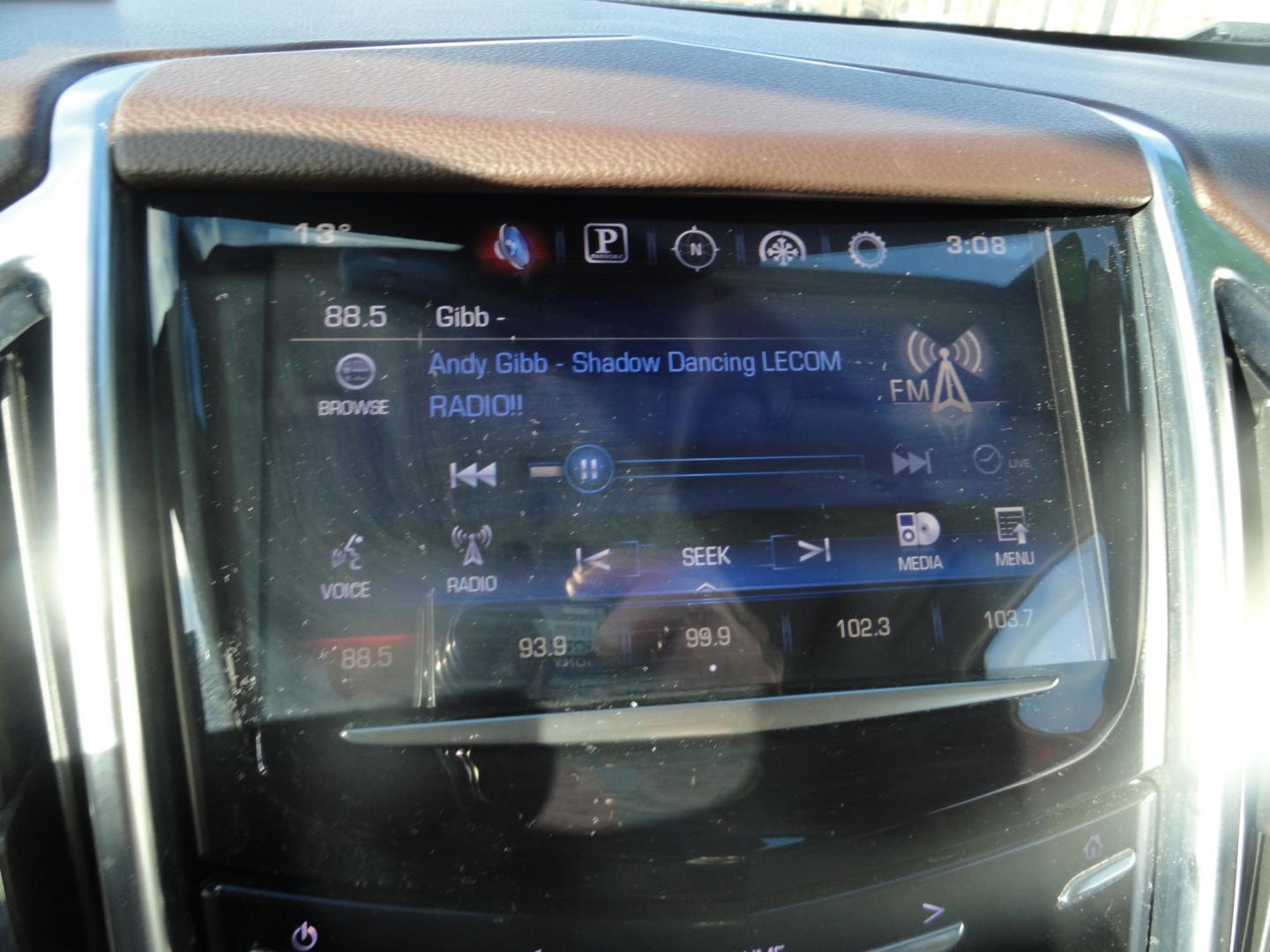 2015 Champagne Silver Metallic /Tan Cadillac SRX Luxury Collection FWD (3GYFNBE31FS) with an 3.6L V6 DOHC 24V FFV engine, 6-Speed Automatic transmission, located at 827 W 26th Street, Erie, PA, 16508, (814) 455-3401, 42.105431, -80.090942 - Thanks for looking at our low mileage accident-free new arrival and a recent trade in at a local Chevrolet dealership. This vehicle was originally sold new In Florida which explains the RUST FREE exterior as well as the like new nonsmoker interior plus it comes with lots of options and it also comes - Photo#9