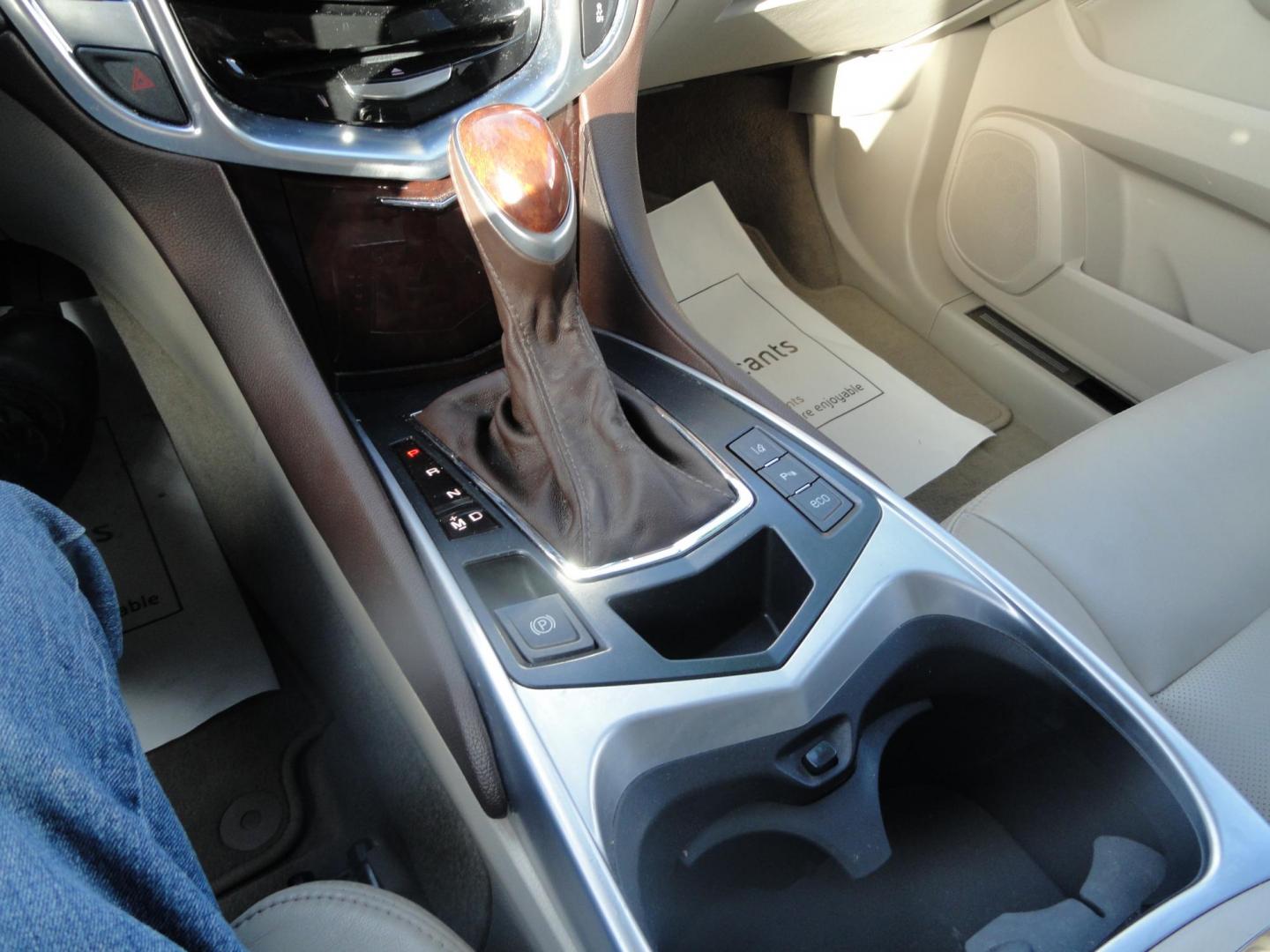 2015 Champagne Silver Metallic /Tan Cadillac SRX Luxury Collection FWD (3GYFNBE31FS) with an 3.6L V6 DOHC 24V FFV engine, 6-Speed Automatic transmission, located at 827 W 26th Street, Erie, PA, 16508, (814) 455-3401, 42.105431, -80.090942 - Thanks for looking at our low mileage accident-free new arrival and a recent trade in at a local Chevrolet dealership. This vehicle was originally sold new In Florida which explains the RUST FREE exterior as well as the like new nonsmoker interior plus it comes with lots of options and it also comes - Photo#12