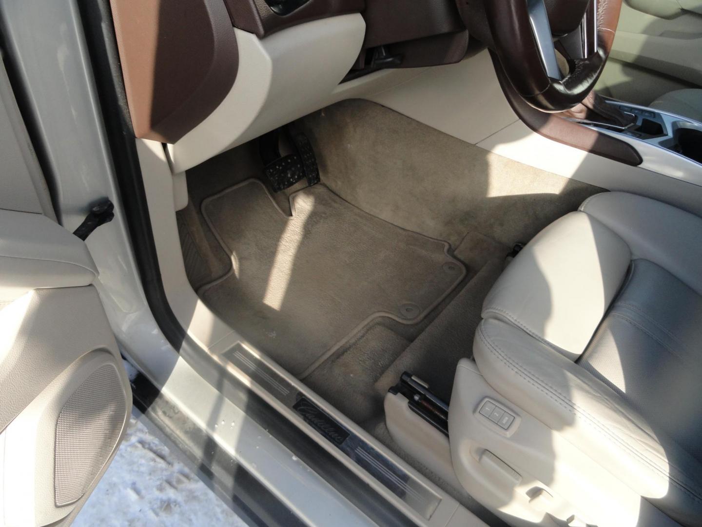 2015 Champagne Silver Metallic /Tan Cadillac SRX Luxury Collection FWD (3GYFNBE31FS) with an 3.6L V6 DOHC 24V FFV engine, 6-Speed Automatic transmission, located at 827 W 26th Street, Erie, PA, 16508, (814) 455-3401, 42.105431, -80.090942 - Thanks for looking at our low mileage accident-free new arrival and a recent trade in at a local Chevrolet dealership. This vehicle was originally sold new In Florida which explains the RUST FREE exterior as well as the like new nonsmoker interior plus it comes with lots of options and it also comes - Photo#17