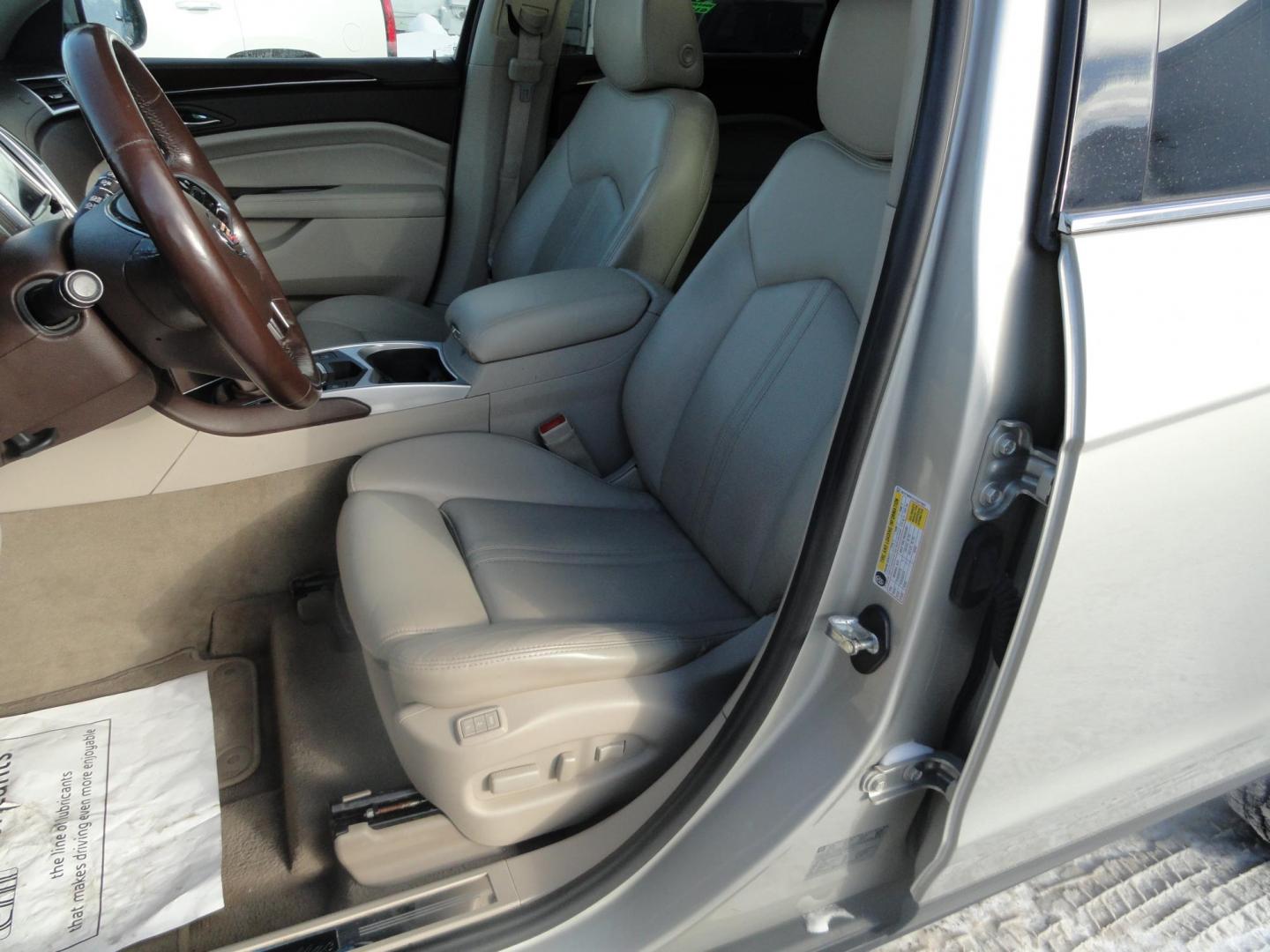 2015 Champagne Silver Metallic /Tan Cadillac SRX Luxury Collection FWD (3GYFNBE31FS) with an 3.6L V6 DOHC 24V FFV engine, 6-Speed Automatic transmission, located at 827 W 26th Street, Erie, PA, 16508, (814) 455-3401, 42.105431, -80.090942 - Thanks for looking at our low mileage accident-free new arrival and a recent trade in at a local Chevrolet dealership. This vehicle was originally sold new In Florida which explains the RUST FREE exterior as well as the like new nonsmoker interior plus it comes with lots of options and it also comes - Photo#19