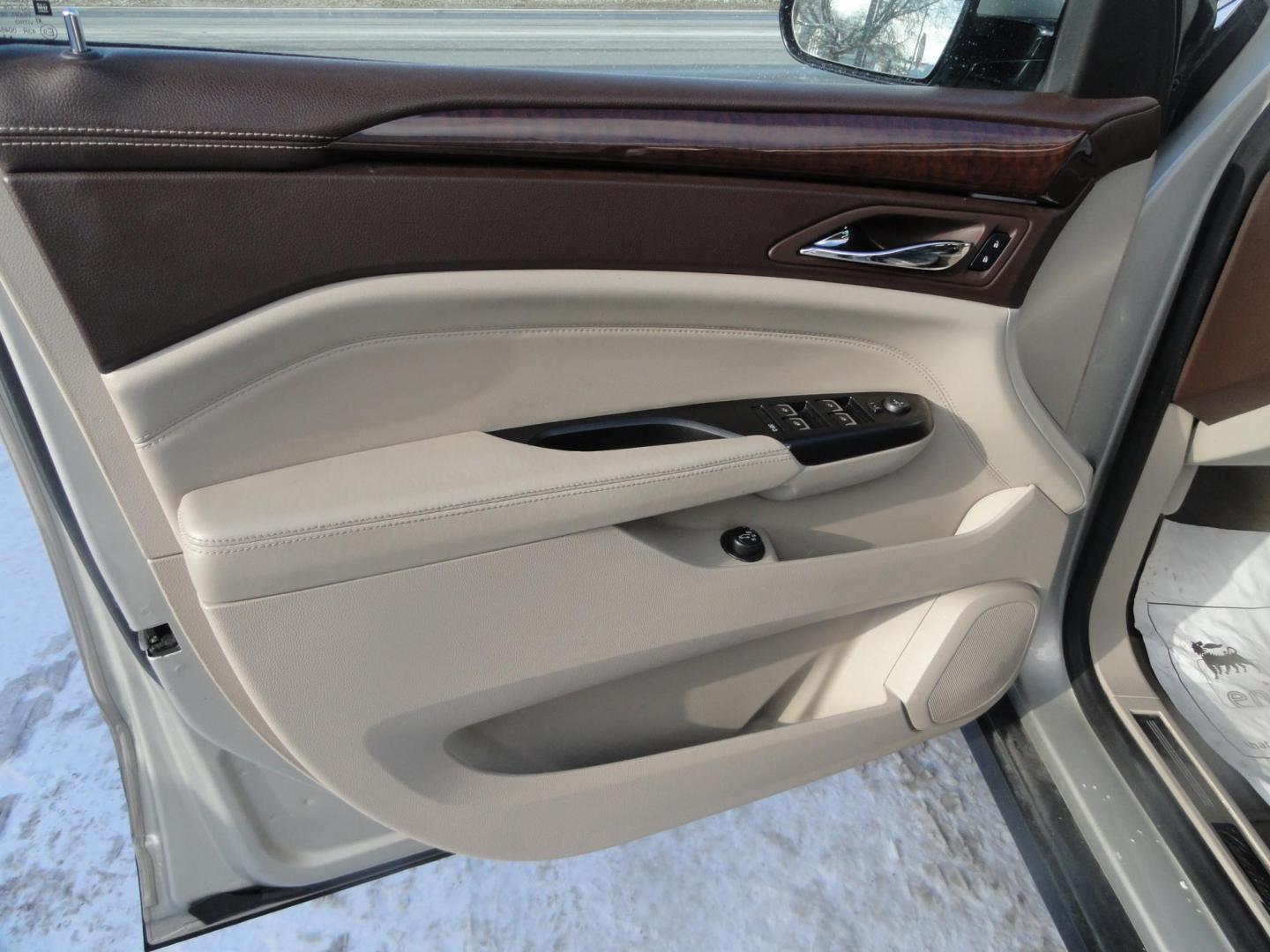 2015 Champagne Silver Metallic /Tan Cadillac SRX Luxury Collection FWD (3GYFNBE31FS) with an 3.6L V6 DOHC 24V FFV engine, 6-Speed Automatic transmission, located at 827 W 26th Street, Erie, PA, 16508, (814) 455-3401, 42.105431, -80.090942 - Thanks for looking at our low mileage accident-free new arrival and a recent trade in at a local Chevrolet dealership. This vehicle was originally sold new In Florida which explains the RUST FREE exterior as well as the like new nonsmoker interior plus it comes with lots of options and it also comes - Photo#21