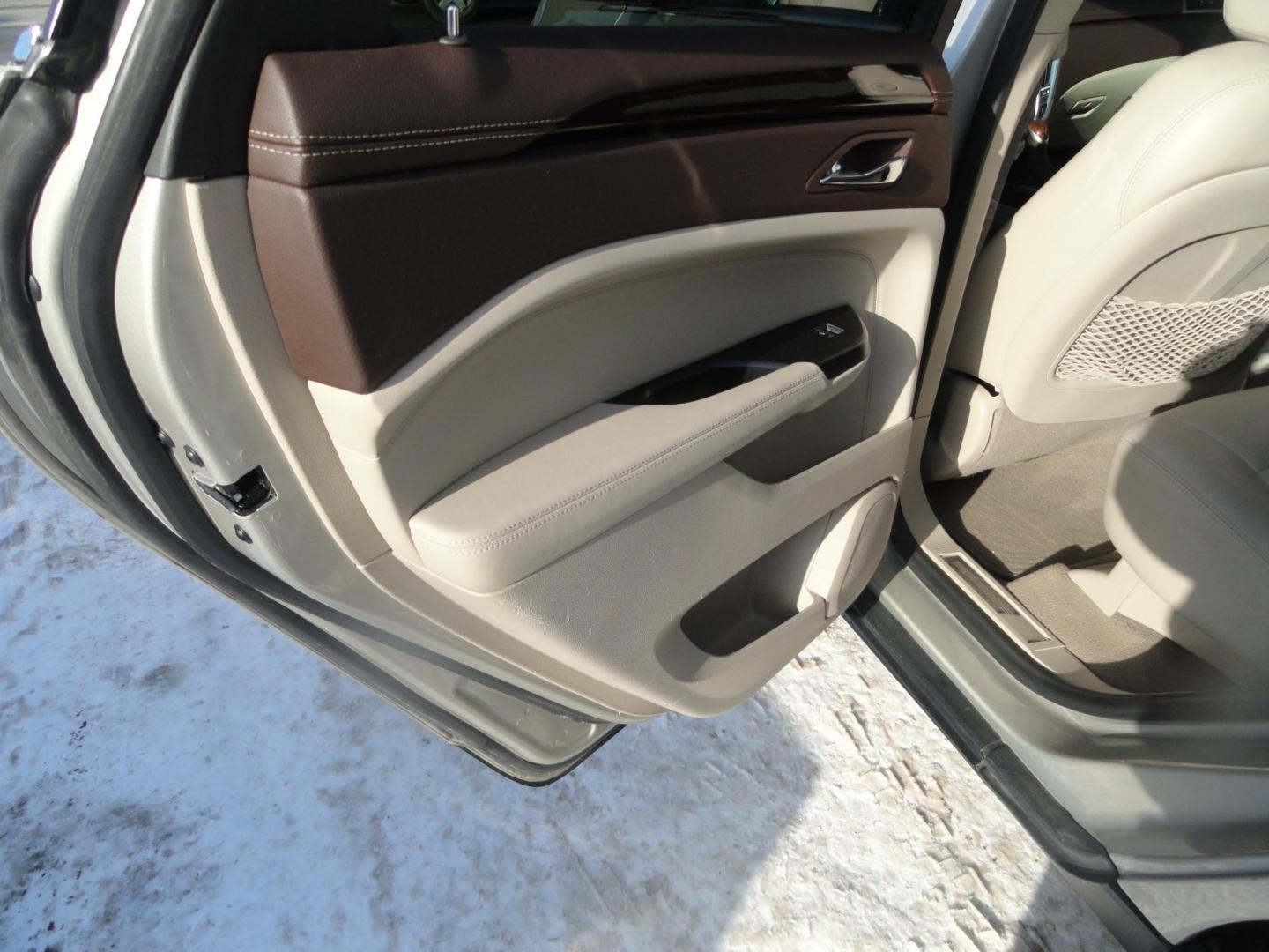 2015 Champagne Silver Metallic /Tan Cadillac SRX Luxury Collection FWD (3GYFNBE31FS) with an 3.6L V6 DOHC 24V FFV engine, 6-Speed Automatic transmission, located at 827 W 26th Street, Erie, PA, 16508, (814) 455-3401, 42.105431, -80.090942 - Thanks for looking at our low mileage accident-free new arrival and a recent trade in at a local Chevrolet dealership. This vehicle was originally sold new In Florida which explains the RUST FREE exterior as well as the like new nonsmoker interior plus it comes with lots of options and it also comes - Photo#23