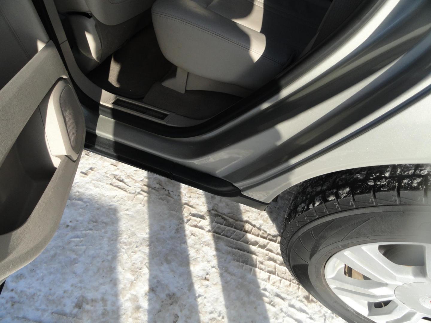 2015 Champagne Silver Metallic /Tan Cadillac SRX Luxury Collection FWD (3GYFNBE31FS) with an 3.6L V6 DOHC 24V FFV engine, 6-Speed Automatic transmission, located at 827 W 26th Street, Erie, PA, 16508, (814) 455-3401, 42.105431, -80.090942 - Thanks for looking at our low mileage accident-free new arrival and a recent trade in at a local Chevrolet dealership. This vehicle was originally sold new In Florida which explains the RUST FREE exterior as well as the like new nonsmoker interior plus it comes with lots of options and it also comes - Photo#24