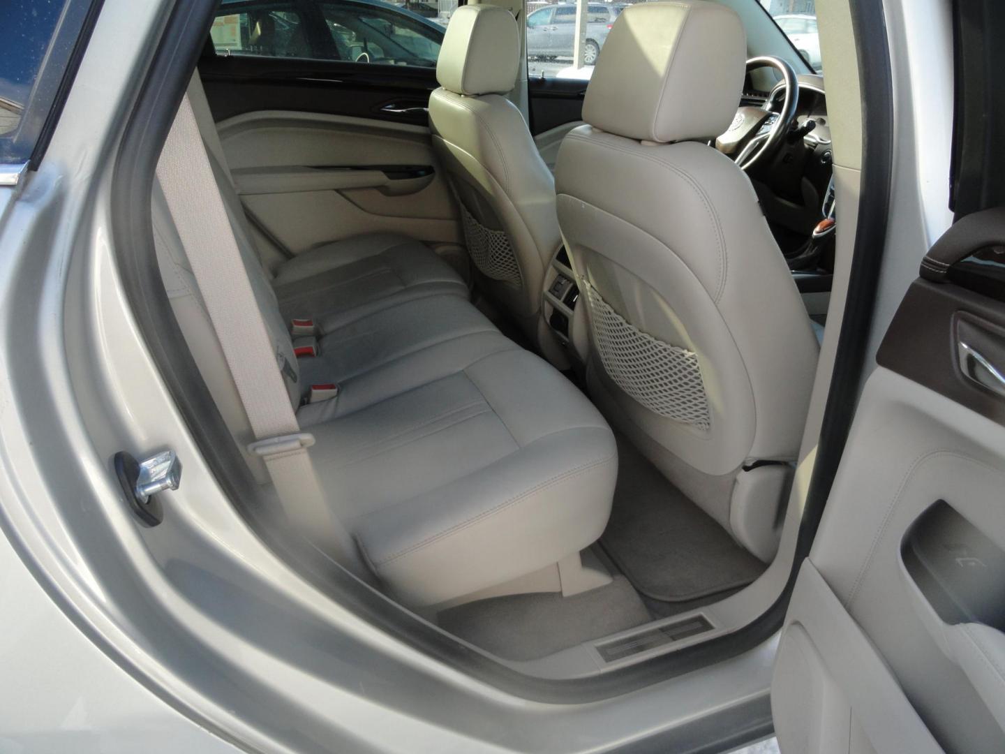 2015 Champagne Silver Metallic /Tan Cadillac SRX Luxury Collection FWD (3GYFNBE31FS) with an 3.6L V6 DOHC 24V FFV engine, 6-Speed Automatic transmission, located at 827 W 26th Street, Erie, PA, 16508, (814) 455-3401, 42.105431, -80.090942 - Thanks for looking at our low mileage accident-free new arrival and a recent trade in at a local Chevrolet dealership. This vehicle was originally sold new In Florida which explains the RUST FREE exterior as well as the like new nonsmoker interior plus it comes with lots of options and it also comes - Photo#27