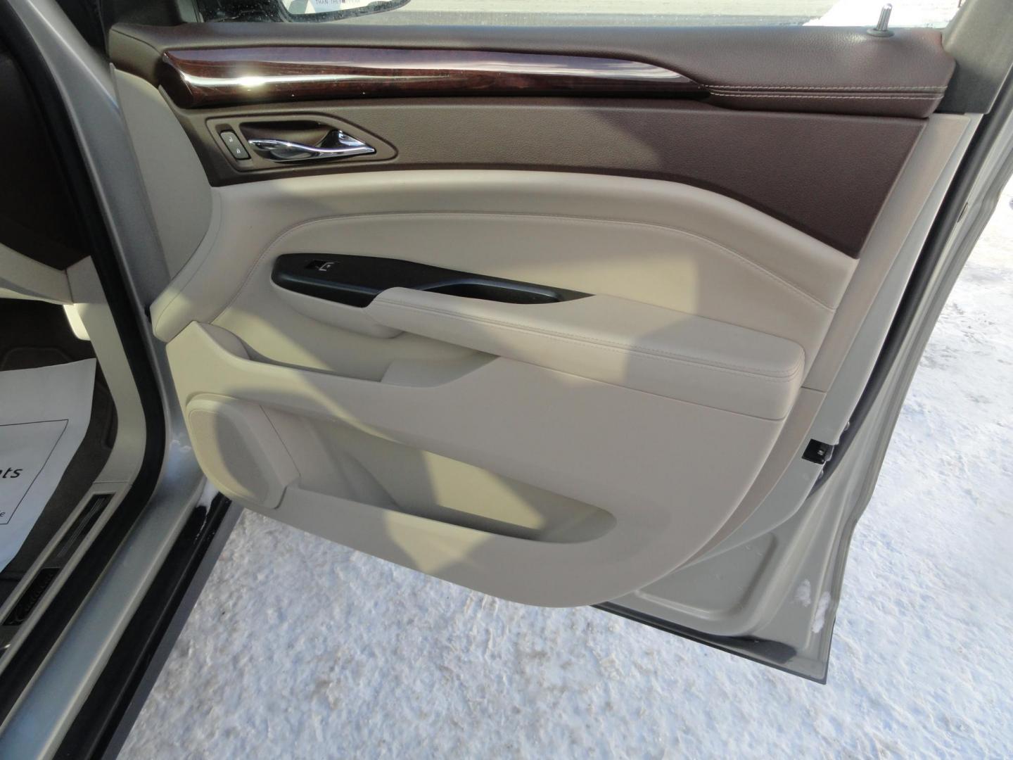 2015 Champagne Silver Metallic /Tan Cadillac SRX Luxury Collection FWD (3GYFNBE31FS) with an 3.6L V6 DOHC 24V FFV engine, 6-Speed Automatic transmission, located at 827 W 26th Street, Erie, PA, 16508, (814) 455-3401, 42.105431, -80.090942 - Thanks for looking at our low mileage accident-free new arrival and a recent trade in at a local Chevrolet dealership. This vehicle was originally sold new In Florida which explains the RUST FREE exterior as well as the like new nonsmoker interior plus it comes with lots of options and it also comes - Photo#33