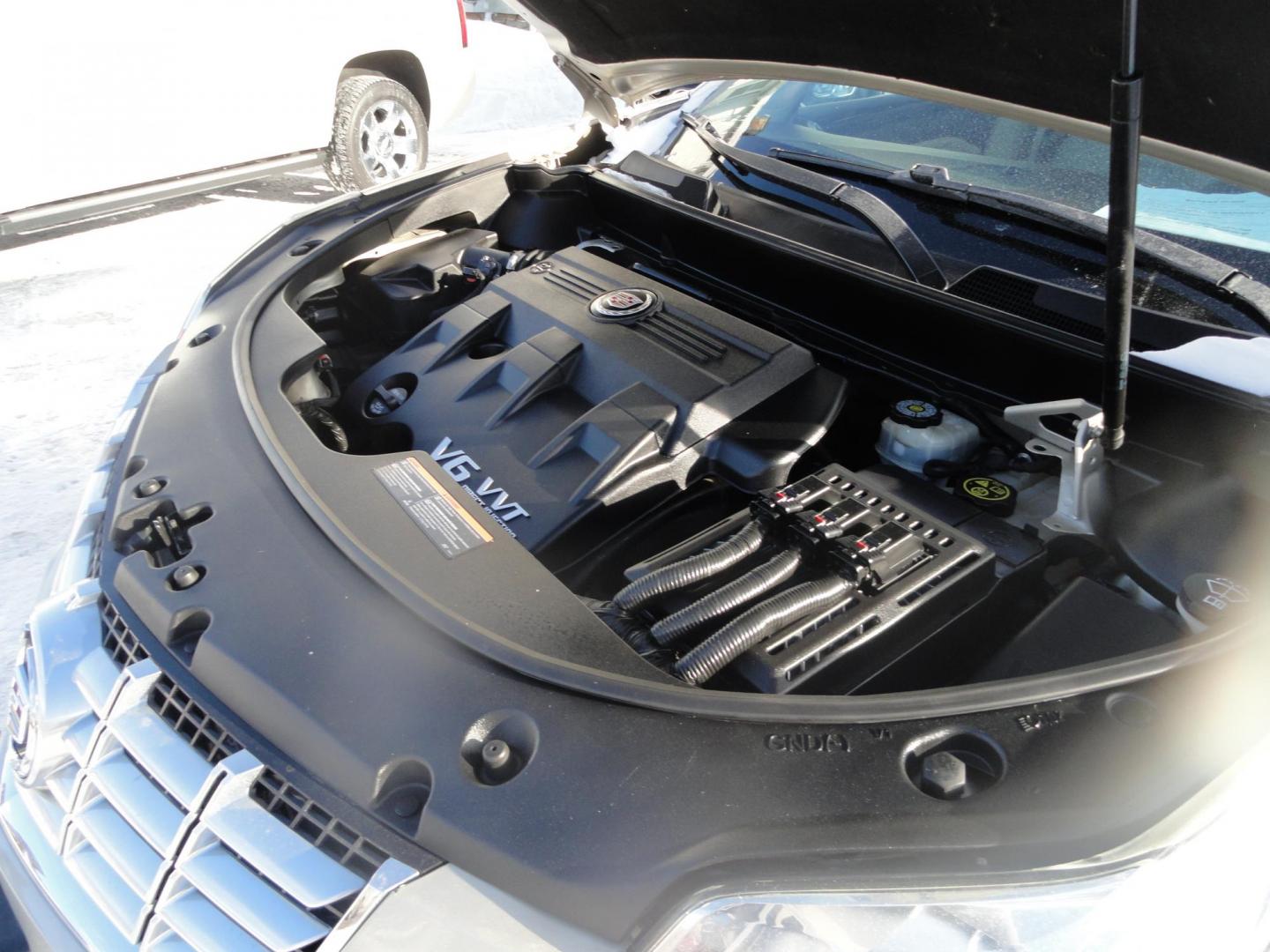 2015 Champagne Silver Metallic /Tan Cadillac SRX Luxury Collection FWD (3GYFNBE31FS) with an 3.6L V6 DOHC 24V FFV engine, 6-Speed Automatic transmission, located at 827 W 26th Street, Erie, PA, 16508, (814) 455-3401, 42.105431, -80.090942 - Thanks for looking at our low mileage accident-free new arrival and a recent trade in at a local Chevrolet dealership. This vehicle was originally sold new In Florida which explains the RUST FREE exterior as well as the like new nonsmoker interior plus it comes with lots of options and it also comes - Photo#36