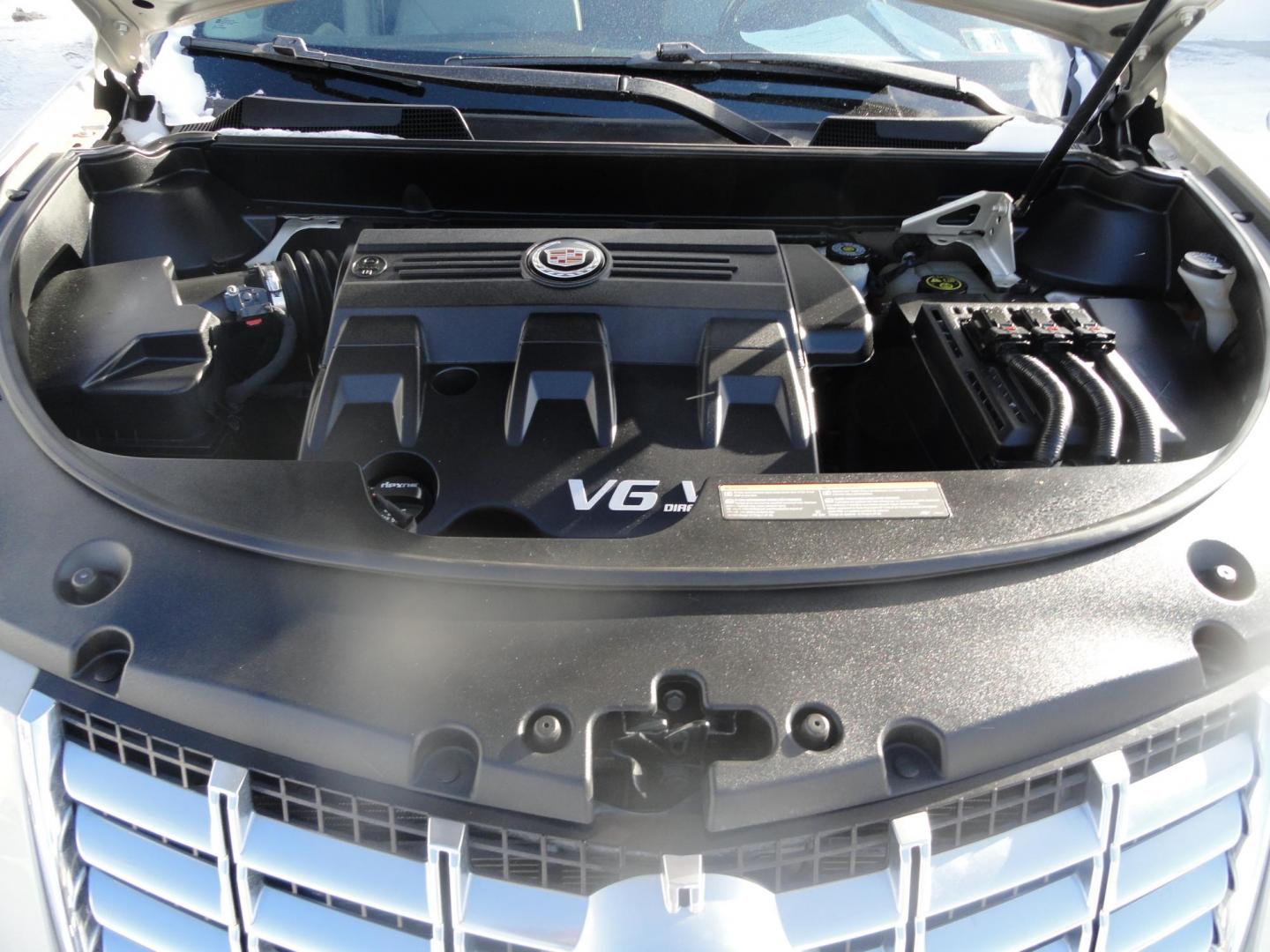 2015 Champagne Silver Metallic /Tan Cadillac SRX Luxury Collection FWD (3GYFNBE31FS) with an 3.6L V6 DOHC 24V FFV engine, 6-Speed Automatic transmission, located at 827 W 26th Street, Erie, PA, 16508, (814) 455-3401, 42.105431, -80.090942 - Thanks for looking at our low mileage accident-free new arrival and a recent trade in at a local Chevrolet dealership. This vehicle was originally sold new In Florida which explains the RUST FREE exterior as well as the like new nonsmoker interior plus it comes with lots of options and it also comes - Photo#35