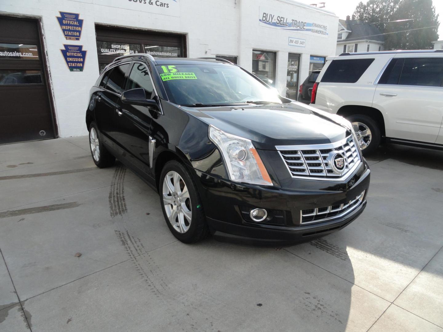 2015 Black Raven /Jet Black Cadillac SRX Performance Collection AWD (3GYFNFE32FS) with an 3.6L V6 DOHC 24V FFV engine, 6-Speed Automatic transmission, located at 827 W 26th Street, Erie, PA, 16508, (814) 455-3401, 42.105431, -80.090942 - Thanks for looking at our low mileage rust and accident-free new Toyota trade. This is the Performance model that started its journey in Florida, then it came up here in the spring of 2021 which explains the excellent condition of this vehicle along with the like new nonsmoker interior and yes, it's - Photo#0