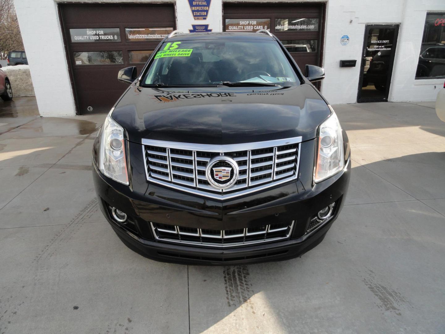 2015 Black Raven /Jet Black Cadillac SRX Performance Collection AWD (3GYFNFE32FS) with an 3.6L V6 DOHC 24V FFV engine, 6-Speed Automatic transmission, located at 827 W 26th Street, Erie, PA, 16508, (814) 455-3401, 42.105431, -80.090942 - Thanks for looking at our low mileage rust and accident-free new Toyota trade. This is the Performance model that started its journey in Florida, then it came up here in the spring of 2021 which explains the excellent condition of this vehicle along with the like new nonsmoker interior and yes, it's - Photo#1