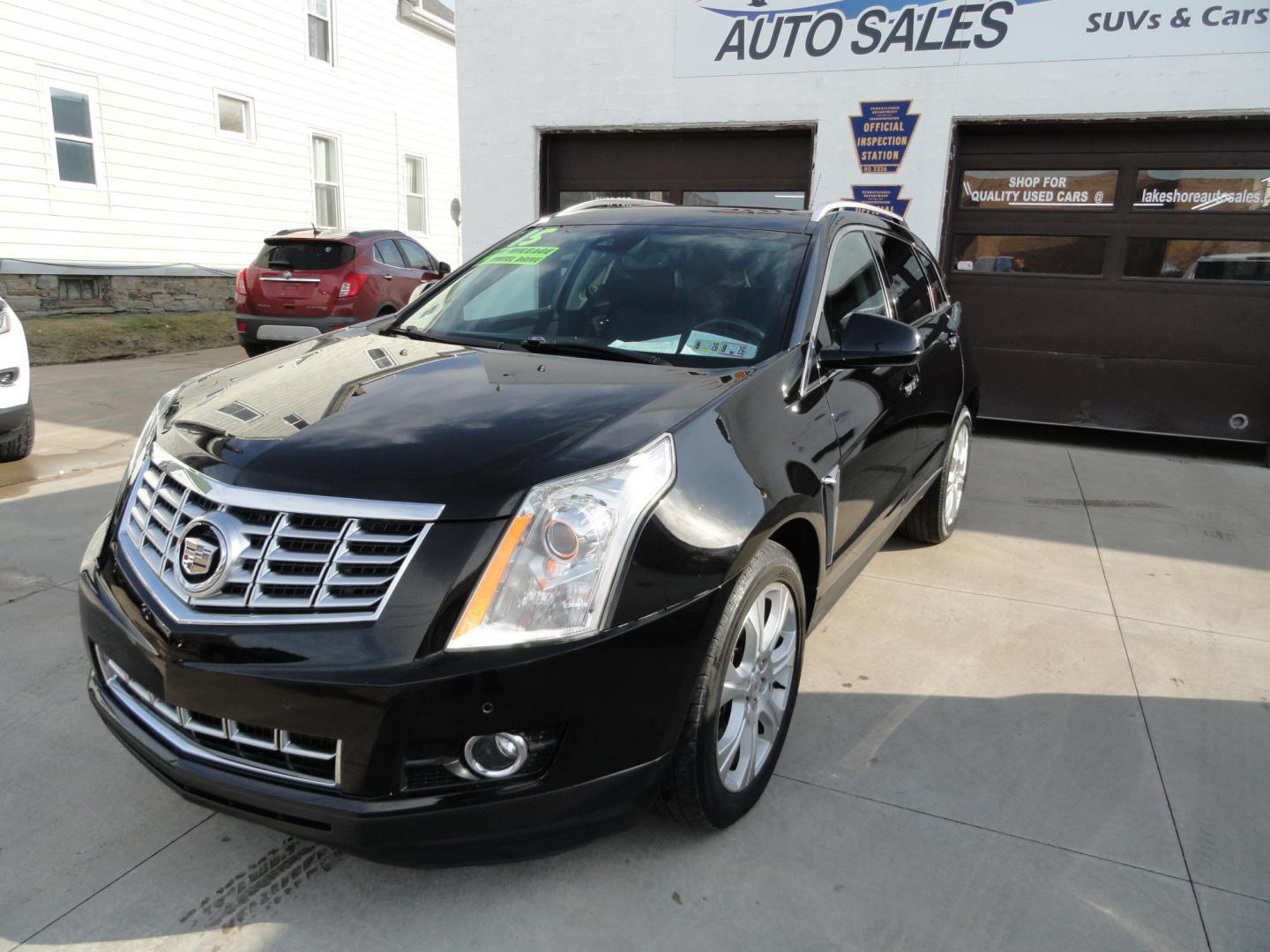 2015 Black Raven /Jet Black Cadillac SRX Performance Collection AWD (3GYFNFE32FS) with an 3.6L V6 DOHC 24V FFV engine, 6-Speed Automatic transmission, located at 827 W 26th Street, Erie, PA, 16508, (814) 455-3401, 42.105431, -80.090942 - Thanks for looking at our low mileage rust and accident-free new Toyota trade. This is the Performance model that started its journey in Florida, then it came up here in the spring of 2021 which explains the excellent condition of this vehicle along with the like new nonsmoker interior and yes, it's - Photo#7