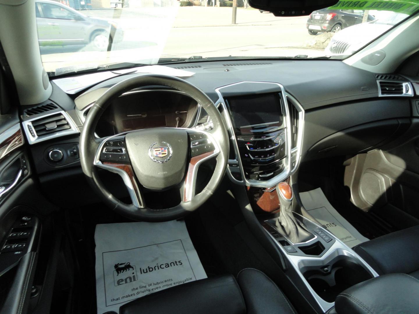 2015 Black Raven /Jet Black Cadillac SRX Performance Collection AWD (3GYFNFE32FS) with an 3.6L V6 DOHC 24V FFV engine, 6-Speed Automatic transmission, located at 827 W 26th Street, Erie, PA, 16508, (814) 455-3401, 42.105431, -80.090942 - Thanks for looking at our low mileage rust and accident-free new Toyota trade. This is the Performance model that started its journey in Florida, then it came up here in the spring of 2021 which explains the excellent condition of this vehicle along with the like new nonsmoker interior and yes, it's - Photo#8