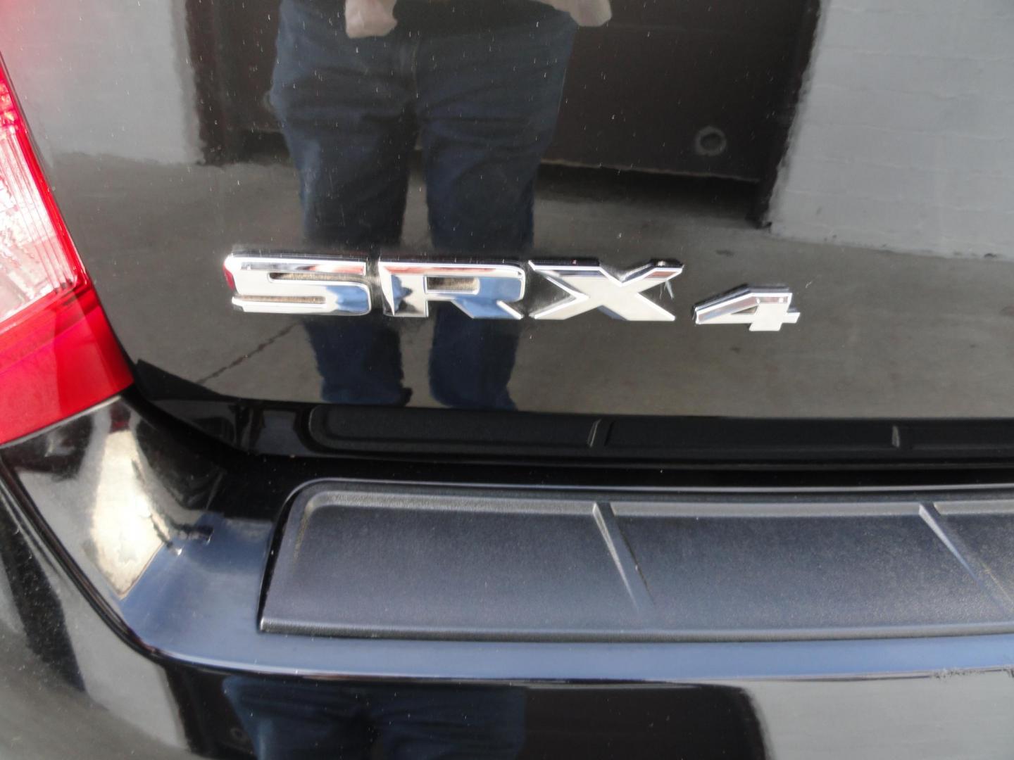 2015 Black Raven /Jet Black Cadillac SRX Performance Collection AWD (3GYFNFE32FS) with an 3.6L V6 DOHC 24V FFV engine, 6-Speed Automatic transmission, located at 827 W 26th Street, Erie, PA, 16508, (814) 455-3401, 42.105431, -80.090942 - Thanks for looking at our low mileage rust and accident-free new Toyota trade. This is the Performance model that started its journey in Florida, then it came up here in the spring of 2021 which explains the excellent condition of this vehicle along with the like new nonsmoker interior and yes, it's - Photo#9