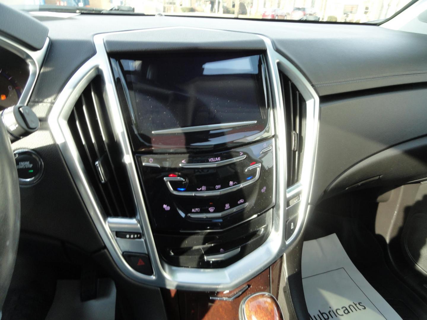 2015 Black Raven /Jet Black Cadillac SRX Performance Collection AWD (3GYFNFE32FS) with an 3.6L V6 DOHC 24V FFV engine, 6-Speed Automatic transmission, located at 827 W 26th Street, Erie, PA, 16508, (814) 455-3401, 42.105431, -80.090942 - Thanks for looking at our low mileage rust and accident-free new Toyota trade. This is the Performance model that started its journey in Florida, then it came up here in the spring of 2021 which explains the excellent condition of this vehicle along with the like new nonsmoker interior and yes, it's - Photo#10