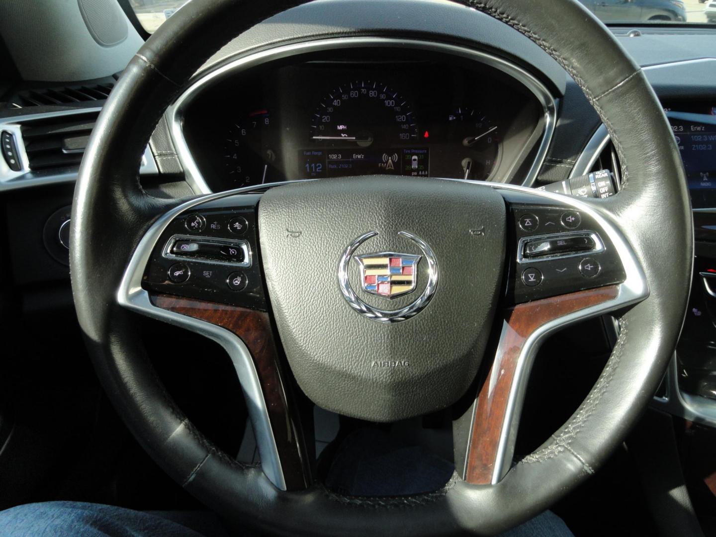 2015 Black Raven /Jet Black Cadillac SRX Performance Collection AWD (3GYFNFE32FS) with an 3.6L V6 DOHC 24V FFV engine, 6-Speed Automatic transmission, located at 827 W 26th Street, Erie, PA, 16508, (814) 455-3401, 42.105431, -80.090942 - Thanks for looking at our low mileage rust and accident-free new Toyota trade. This is the Performance model that started its journey in Florida, then it came up here in the spring of 2021 which explains the excellent condition of this vehicle along with the like new nonsmoker interior and yes, it's - Photo#17