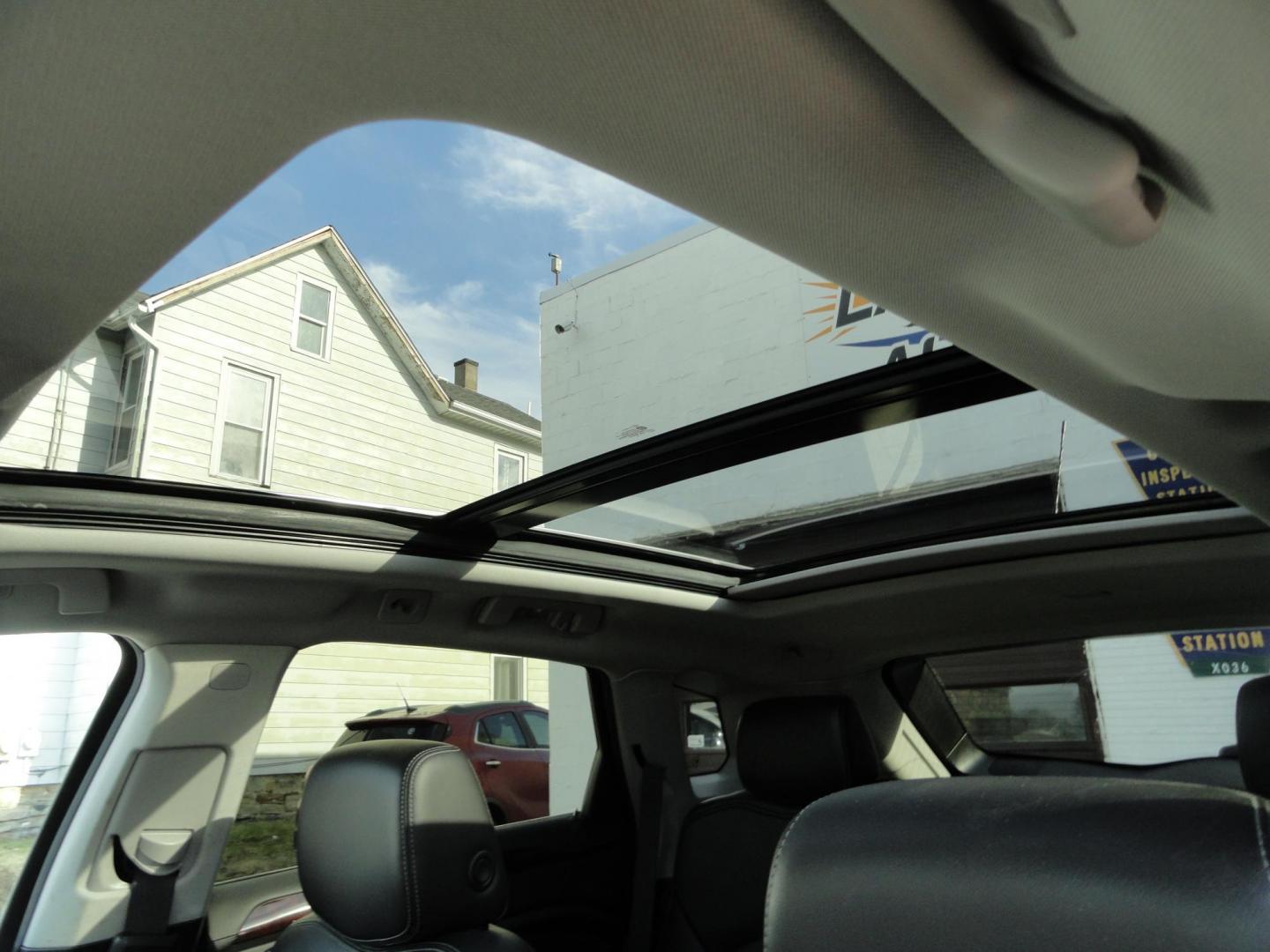 2015 Black Raven /Jet Black Cadillac SRX Performance Collection AWD (3GYFNFE32FS) with an 3.6L V6 DOHC 24V FFV engine, 6-Speed Automatic transmission, located at 827 W 26th Street, Erie, PA, 16508, (814) 455-3401, 42.105431, -80.090942 - Thanks for looking at our low mileage rust and accident-free new Toyota trade. This is the Performance model that started its journey in Florida, then it came up here in the spring of 2021 which explains the excellent condition of this vehicle along with the like new nonsmoker interior and yes, it's - Photo#24