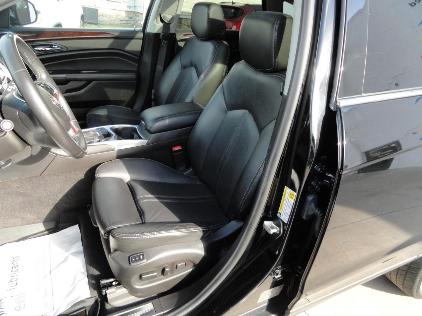 2015 Black Raven /Jet Black Cadillac SRX Performance Collection AWD (3GYFNFE32FS) with an 3.6L V6 DOHC 24V FFV engine, 6-Speed Automatic transmission, located at 827 W 26th Street, Erie, PA, 16508, (814) 455-3401, 42.105431, -80.090942 - Thanks for looking at our low mileage rust and accident-free new Toyota trade. This is the Performance model that started its journey in Florida, then it came up here in the spring of 2021 which explains the excellent condition of this vehicle along with the like new nonsmoker interior and yes, it's - Photo#25