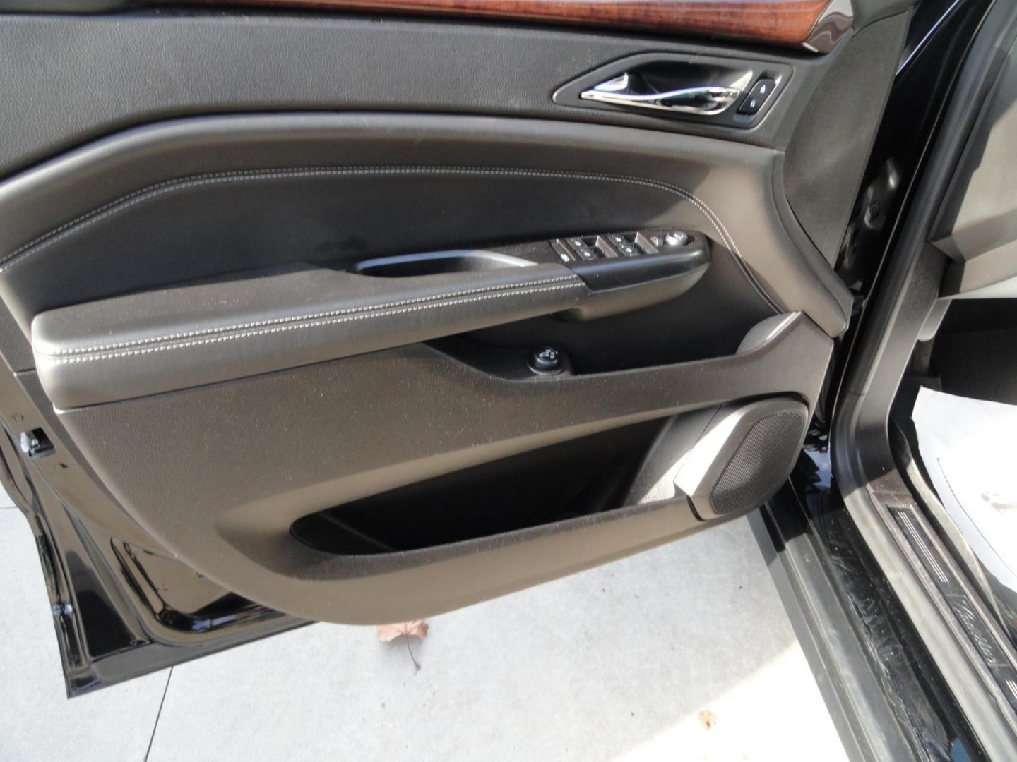 2015 Black Raven /Jet Black Cadillac SRX Performance Collection AWD (3GYFNFE32FS) with an 3.6L V6 DOHC 24V FFV engine, 6-Speed Automatic transmission, located at 827 W 26th Street, Erie, PA, 16508, (814) 455-3401, 42.105431, -80.090942 - Thanks for looking at our low mileage rust and accident-free new Toyota trade. This is the Performance model that started its journey in Florida, then it came up here in the spring of 2021 which explains the excellent condition of this vehicle along with the like new nonsmoker interior and yes, it's - Photo#28