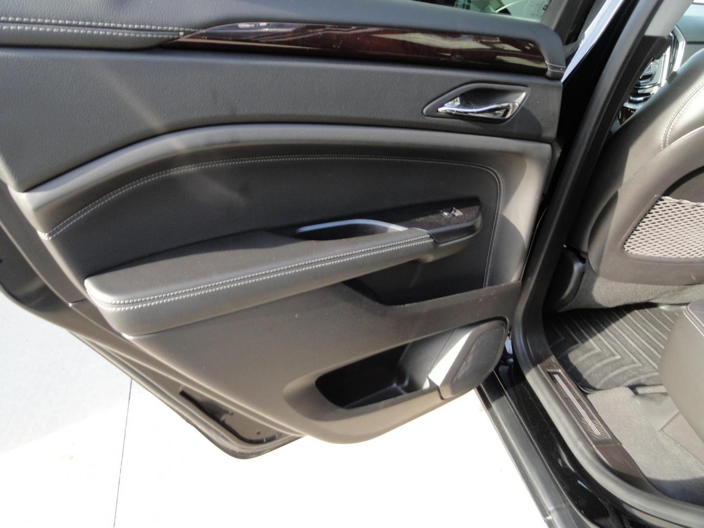 2015 Black Raven /Jet Black Cadillac SRX Performance Collection AWD (3GYFNFE32FS) with an 3.6L V6 DOHC 24V FFV engine, 6-Speed Automatic transmission, located at 827 W 26th Street, Erie, PA, 16508, (814) 455-3401, 42.105431, -80.090942 - Thanks for looking at our low mileage rust and accident-free new Toyota trade. This is the Performance model that started its journey in Florida, then it came up here in the spring of 2021 which explains the excellent condition of this vehicle along with the like new nonsmoker interior and yes, it's - Photo#32