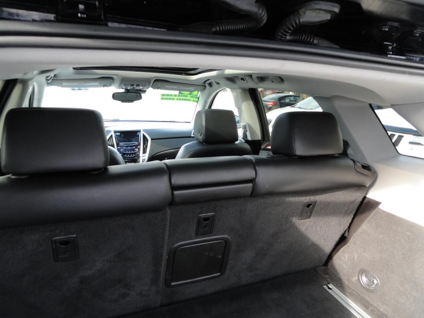 2015 Black Raven /Jet Black Cadillac SRX Performance Collection AWD (3GYFNFE32FS) with an 3.6L V6 DOHC 24V FFV engine, 6-Speed Automatic transmission, located at 827 W 26th Street, Erie, PA, 16508, (814) 455-3401, 42.105431, -80.090942 - Thanks for looking at our low mileage rust and accident-free new Toyota trade. This is the Performance model that started its journey in Florida, then it came up here in the spring of 2021 which explains the excellent condition of this vehicle along with the like new nonsmoker interior and yes, it's - Photo#33